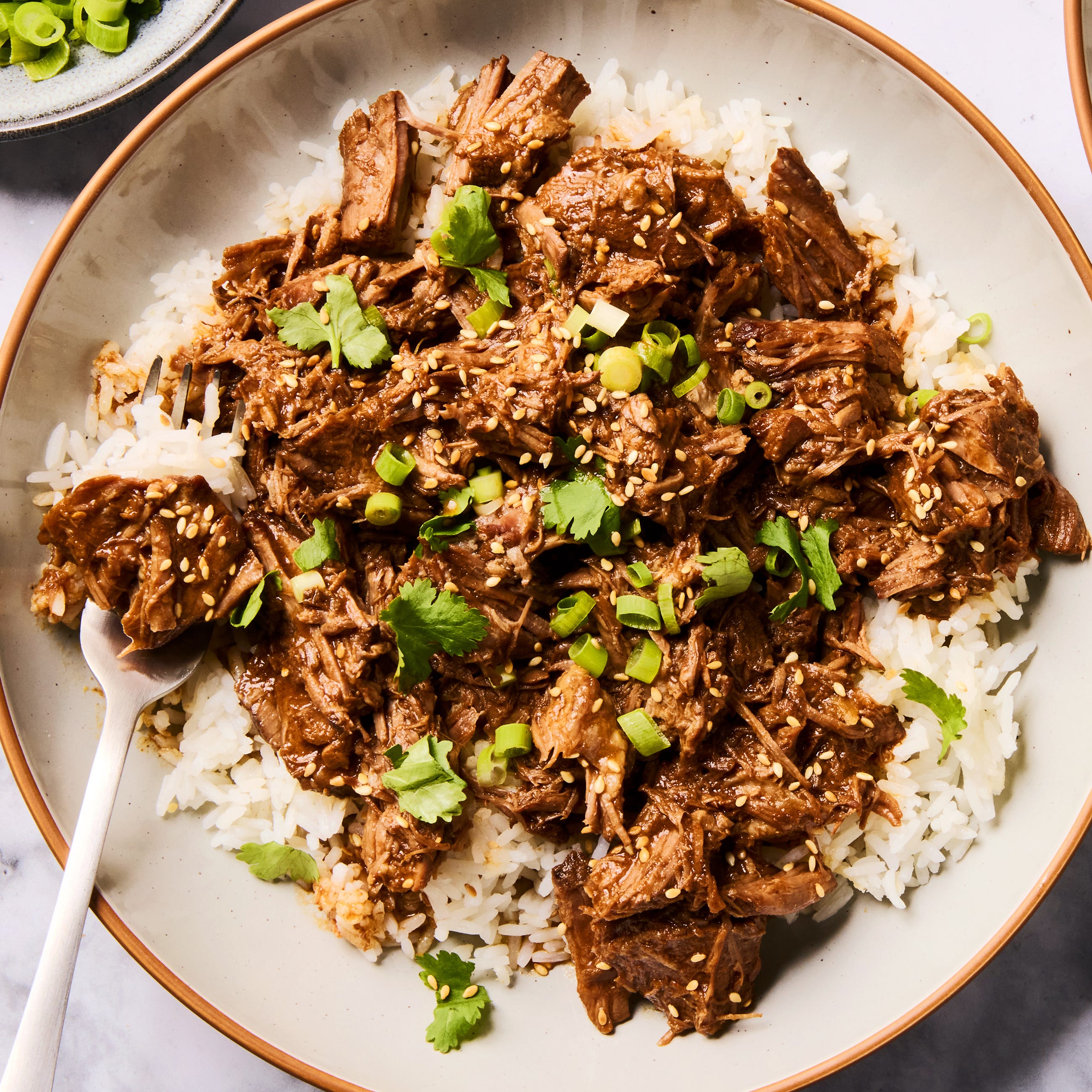 Slow-Cooker Korean Beef Makes Busy Weeknights Easier Than Ever Slow-Cooker Korean Beef Makes Busy Weeknights Easier Than Ever