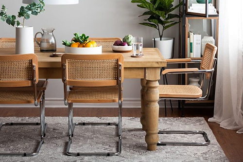 A Brief History of the Dining Chair You're Seeing Everywhere