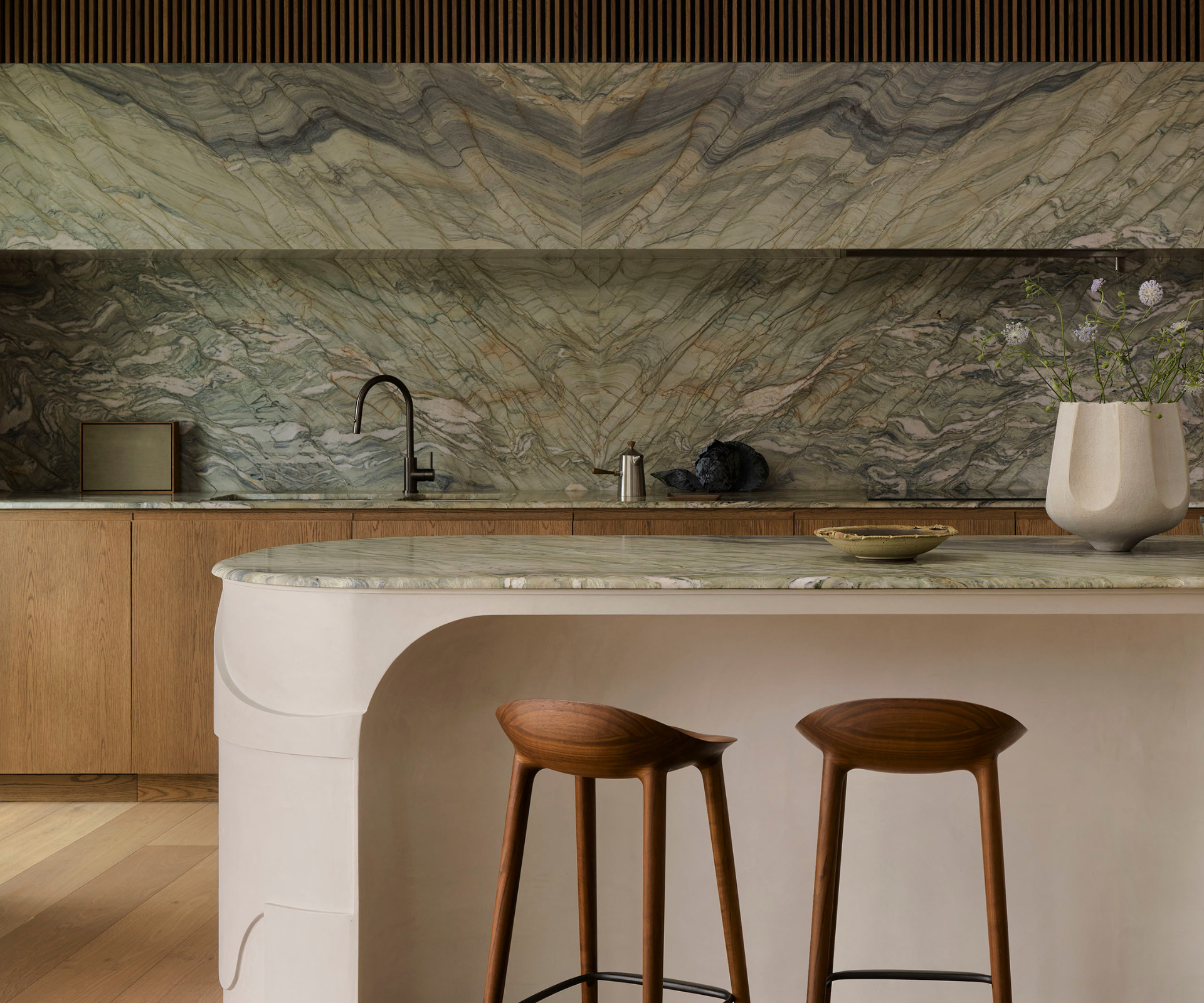 A dynamic family retreat by Decus with sweeping ocean views