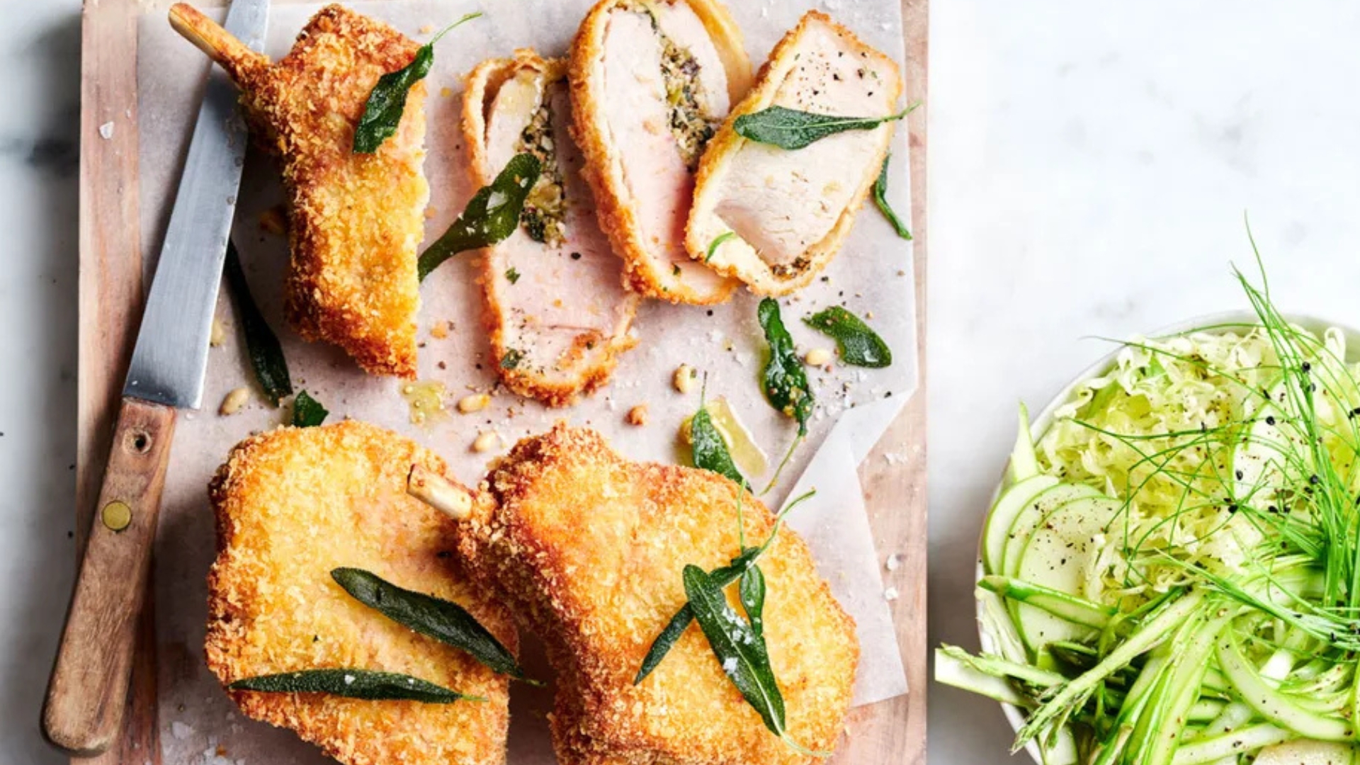 Stuffed pork cutlets with asparagus slaw