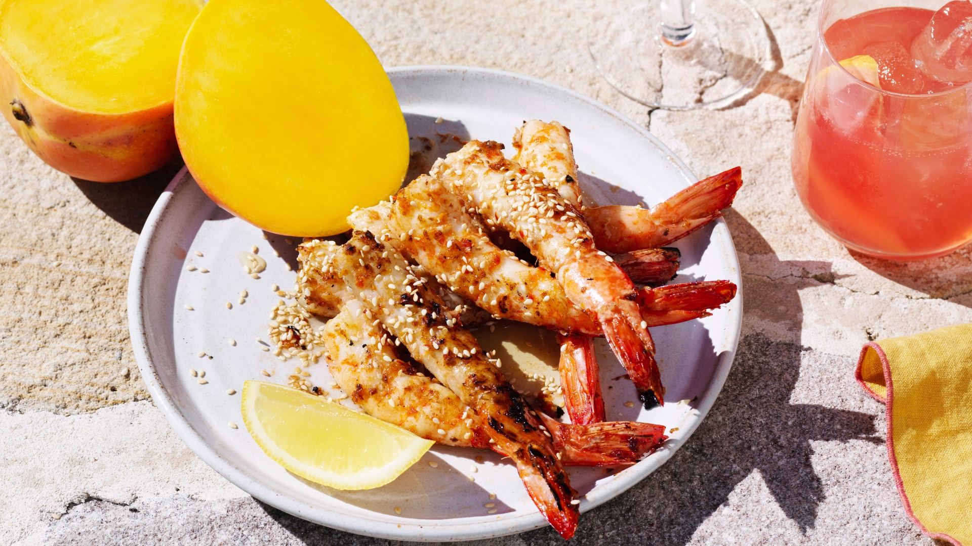 Barbecued prawns with lemon, honey and sesame