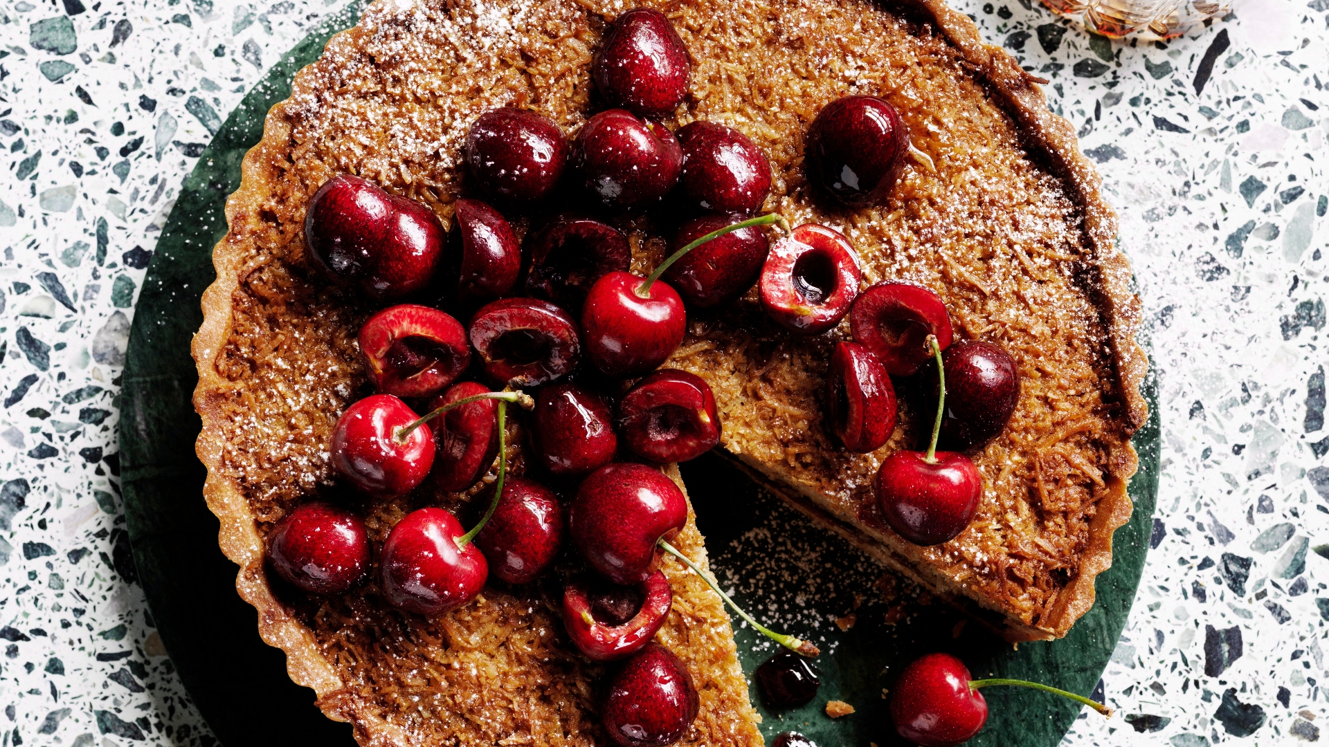 Coconut and cherry frangipane tart