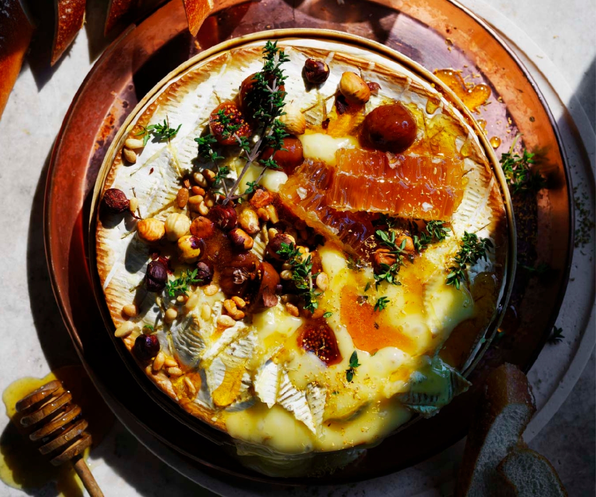 Gooey baked brie with fennel pollen and burnt honey nuts
