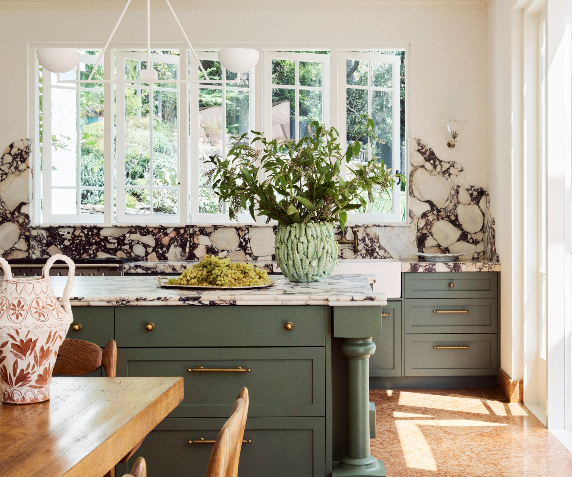 Inside a sunlit Spanish-style home that embraces separate living