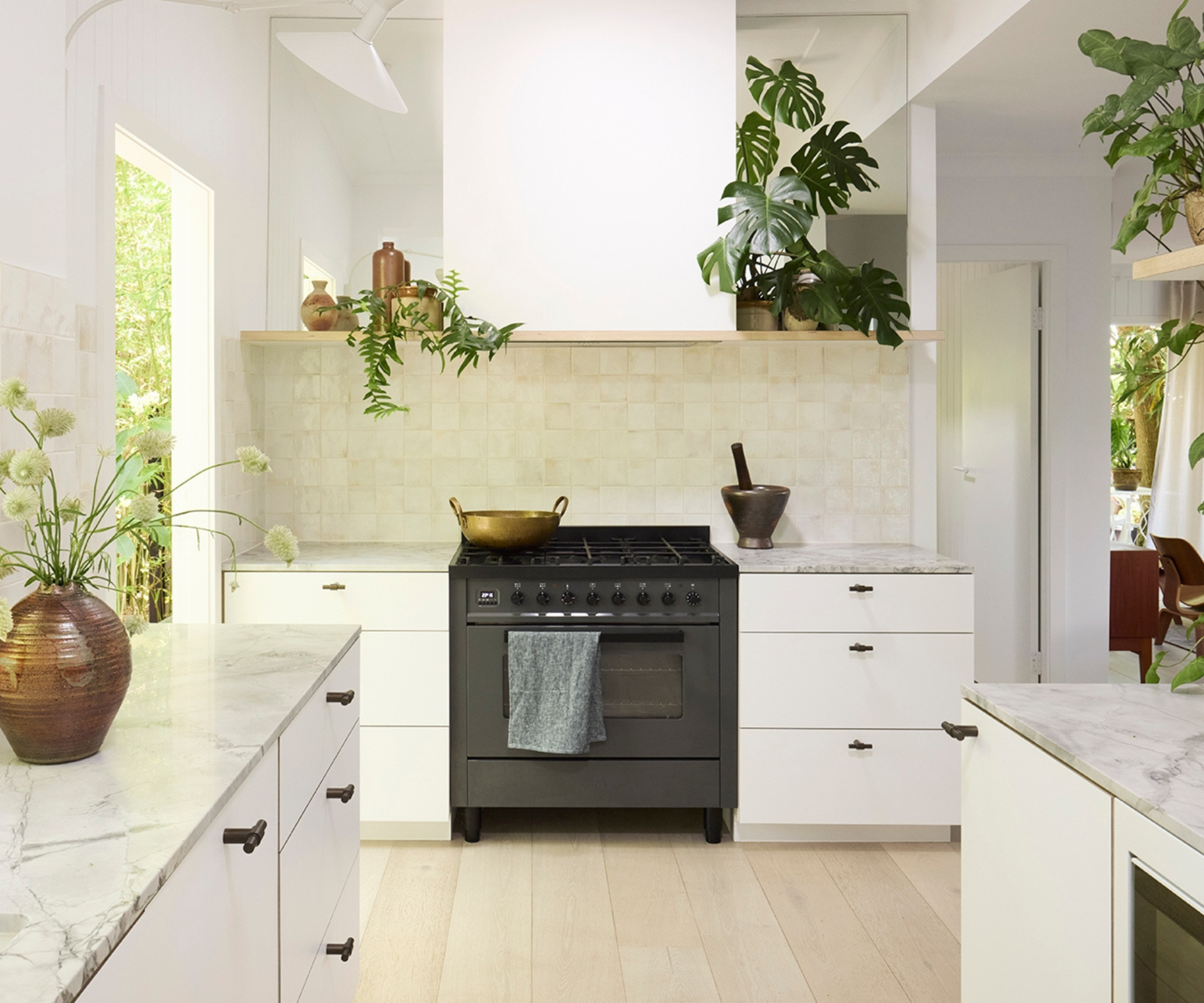 How an old bed factory and 1950s beach house found a blissful new beginning