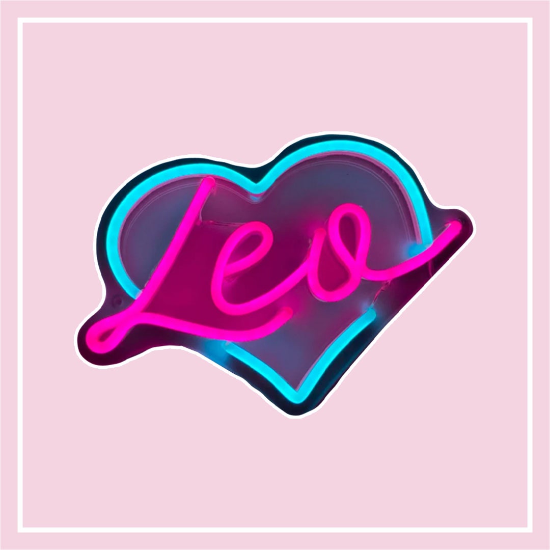neon sign with Leo in the middle of a heart