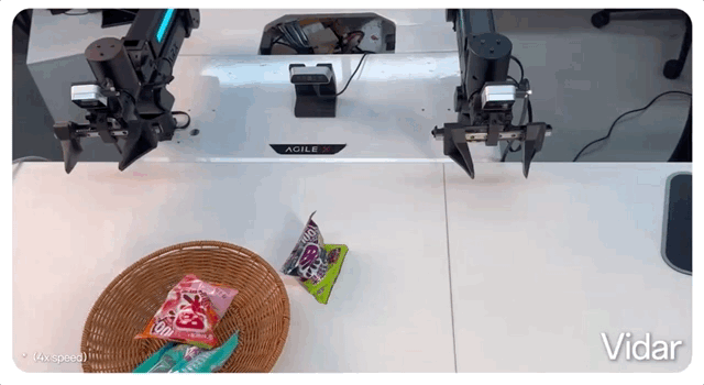 Robot arm picking up a purple pouch and placing it in a person's hand.