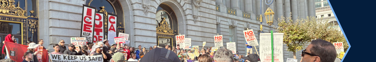 Crowd of people protesting ICE.
