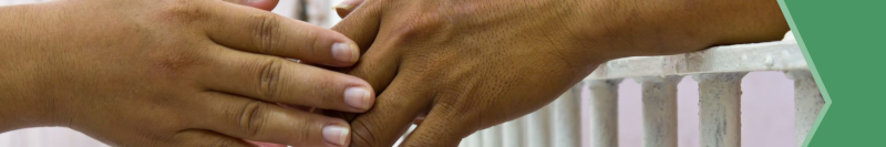 Image of two hands touching