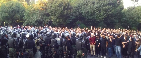Protestors in front of police