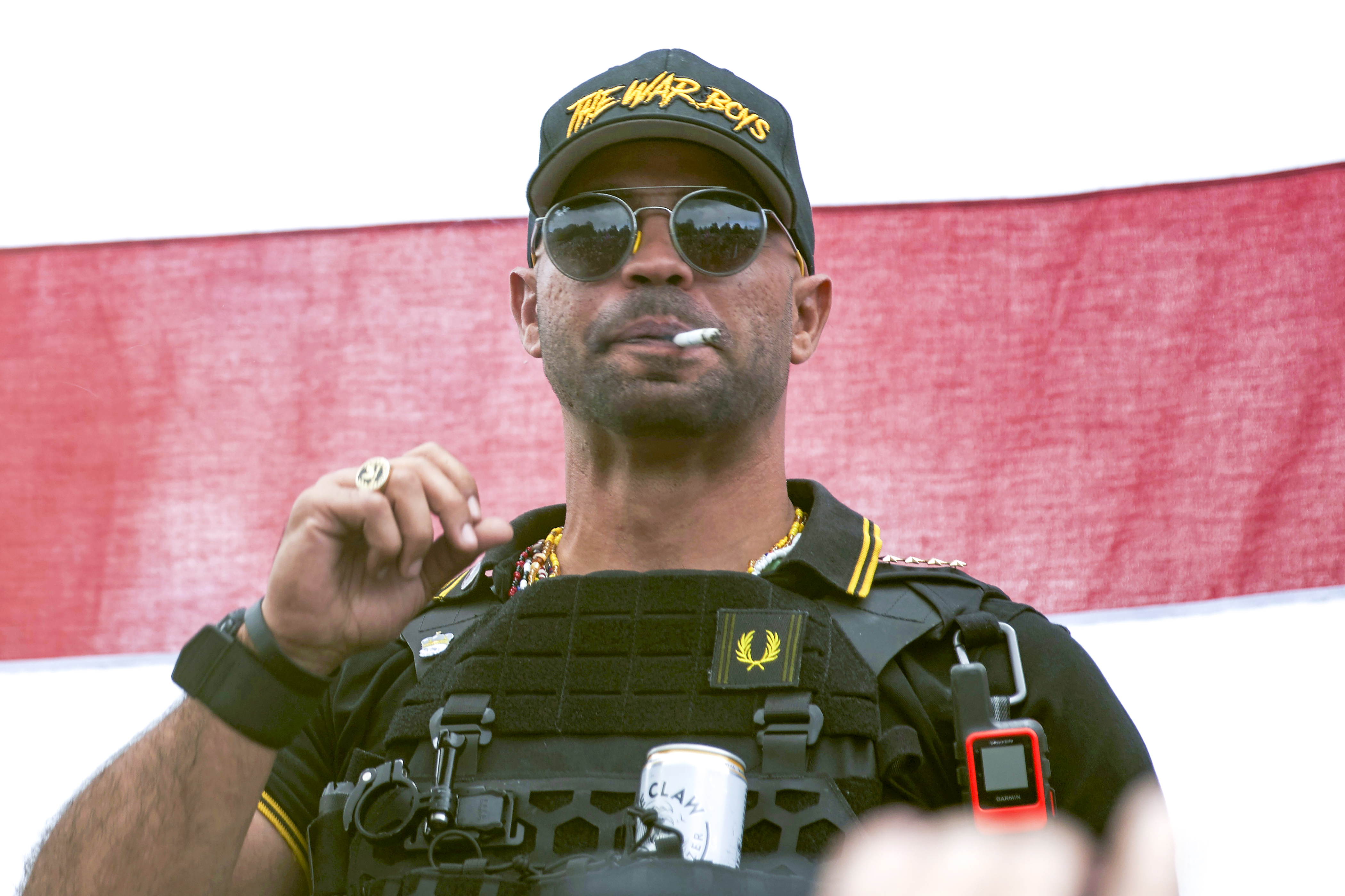 Proud Boys leader Henry ''Enrique'' Tarrio wears a hat that says The War Boys during a rally in Portland, Ore., on Sept. 26, 2020. 