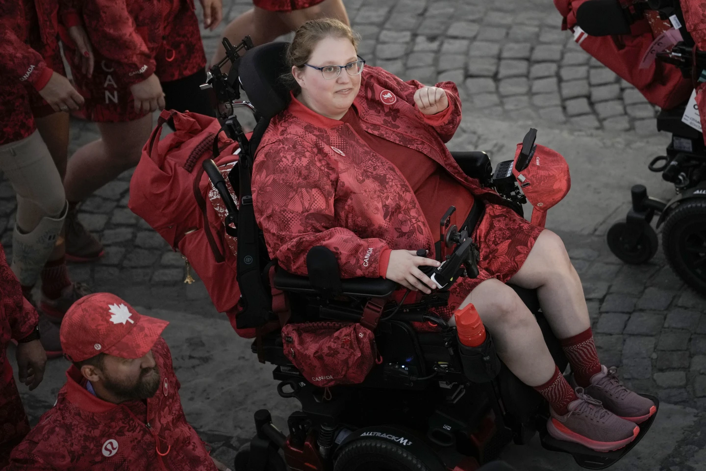 Alison Levine parades with fellow athletes in the Paralympics Opening Ceremony from Team Canada in Paris, Wednesday Aug. 28, 2024.