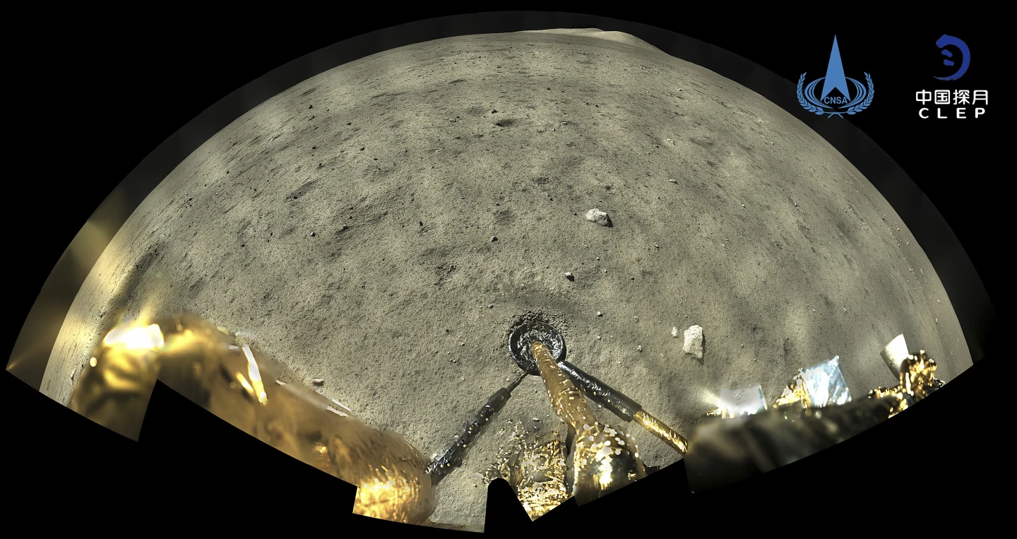 An image taken by panoramic camera aboard the lander-ascender combination of Chang'e-5 spacecraft provided by China National Space Administration shows a moon surface after it landed on the moon.