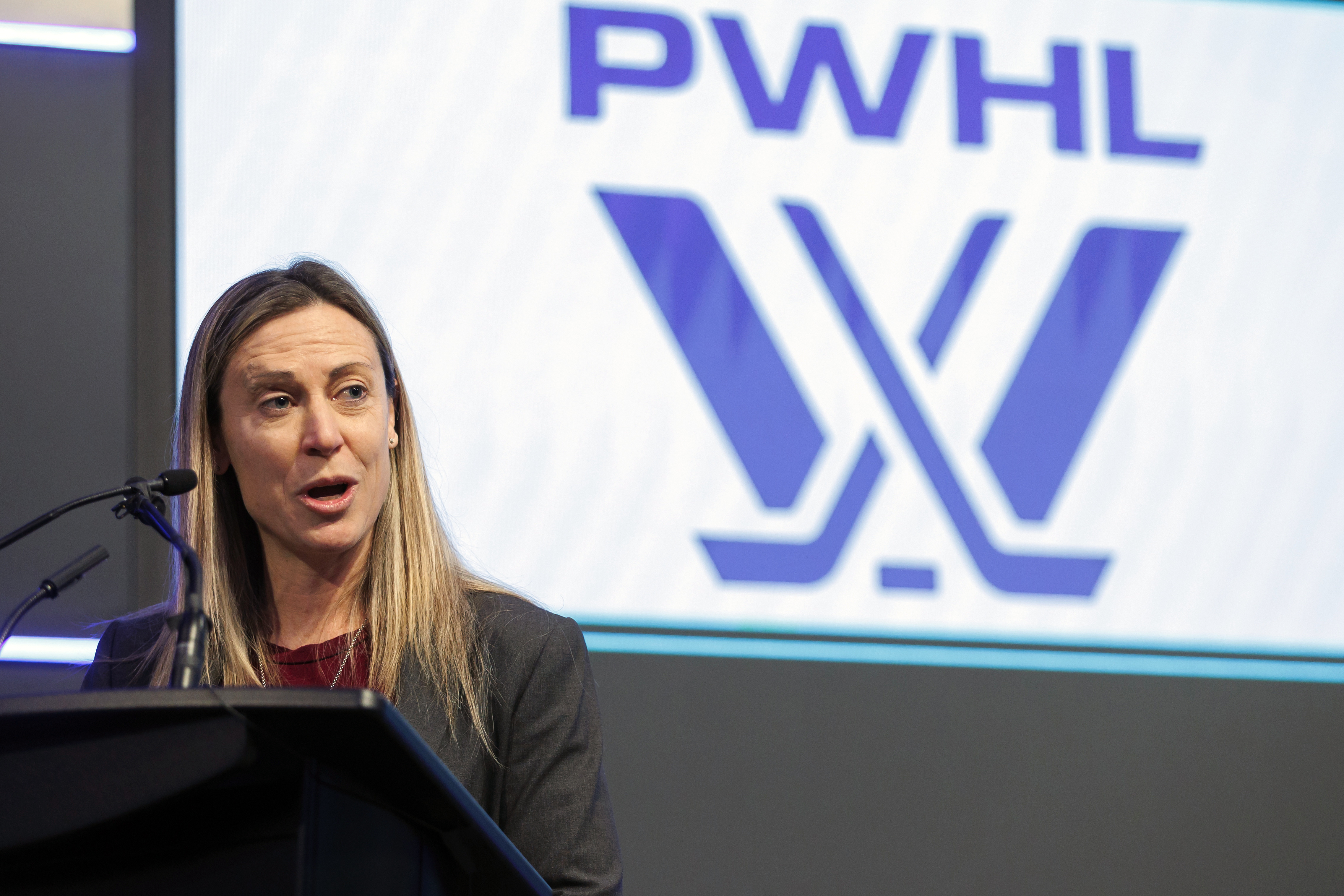 Professional Women's Hockey League senior vice president of hockey operations Jayna Hefford speaks before the PWHL Toronto team opened the Toronto Stock Exchange in Toronto in January 2024. (Cole Burston/The Canadian Press via AP, File).