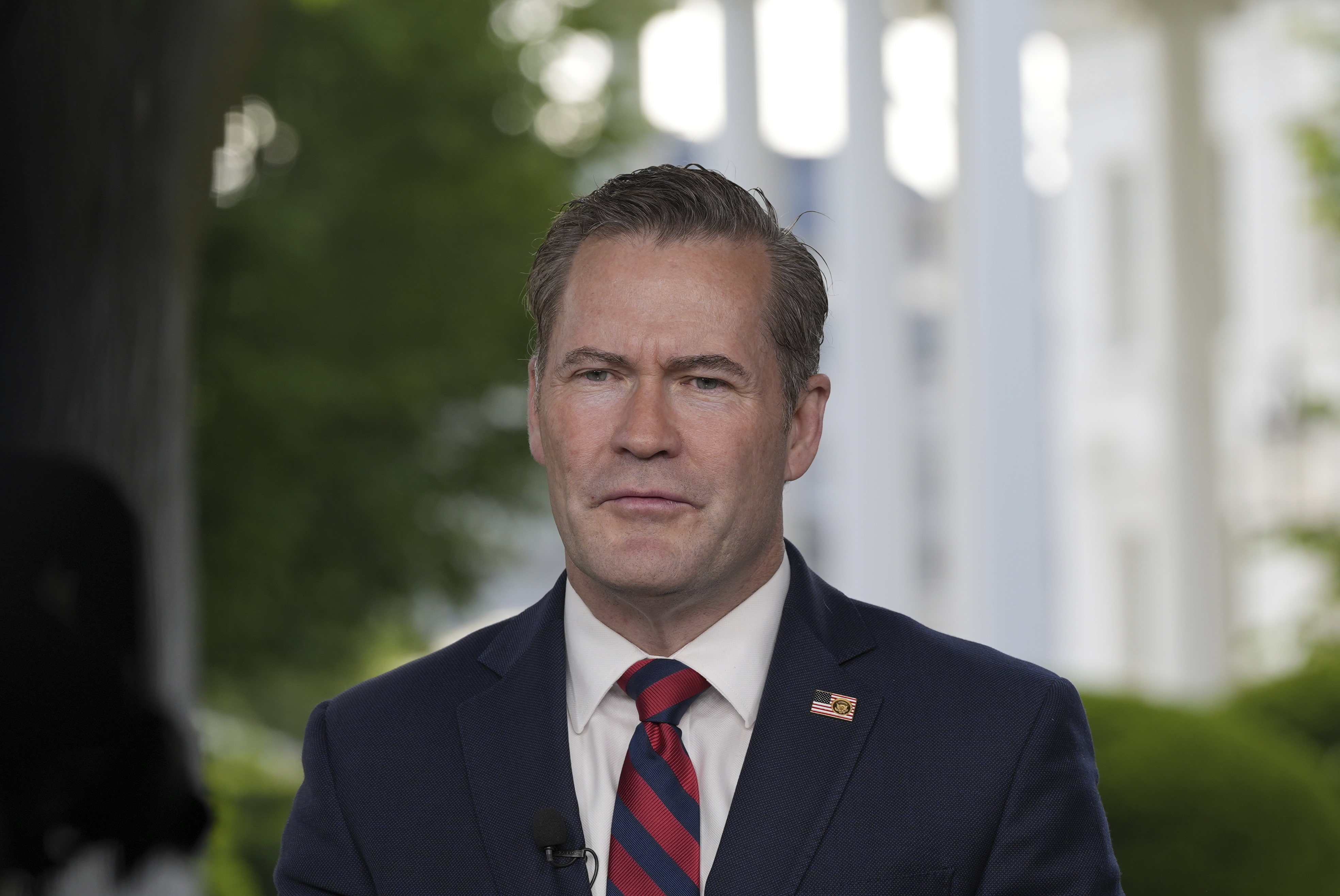 National Security Advisor Mike Waltz speaks during a television interview at the White House on Thursday. (AP Photo/Alex Brandon).