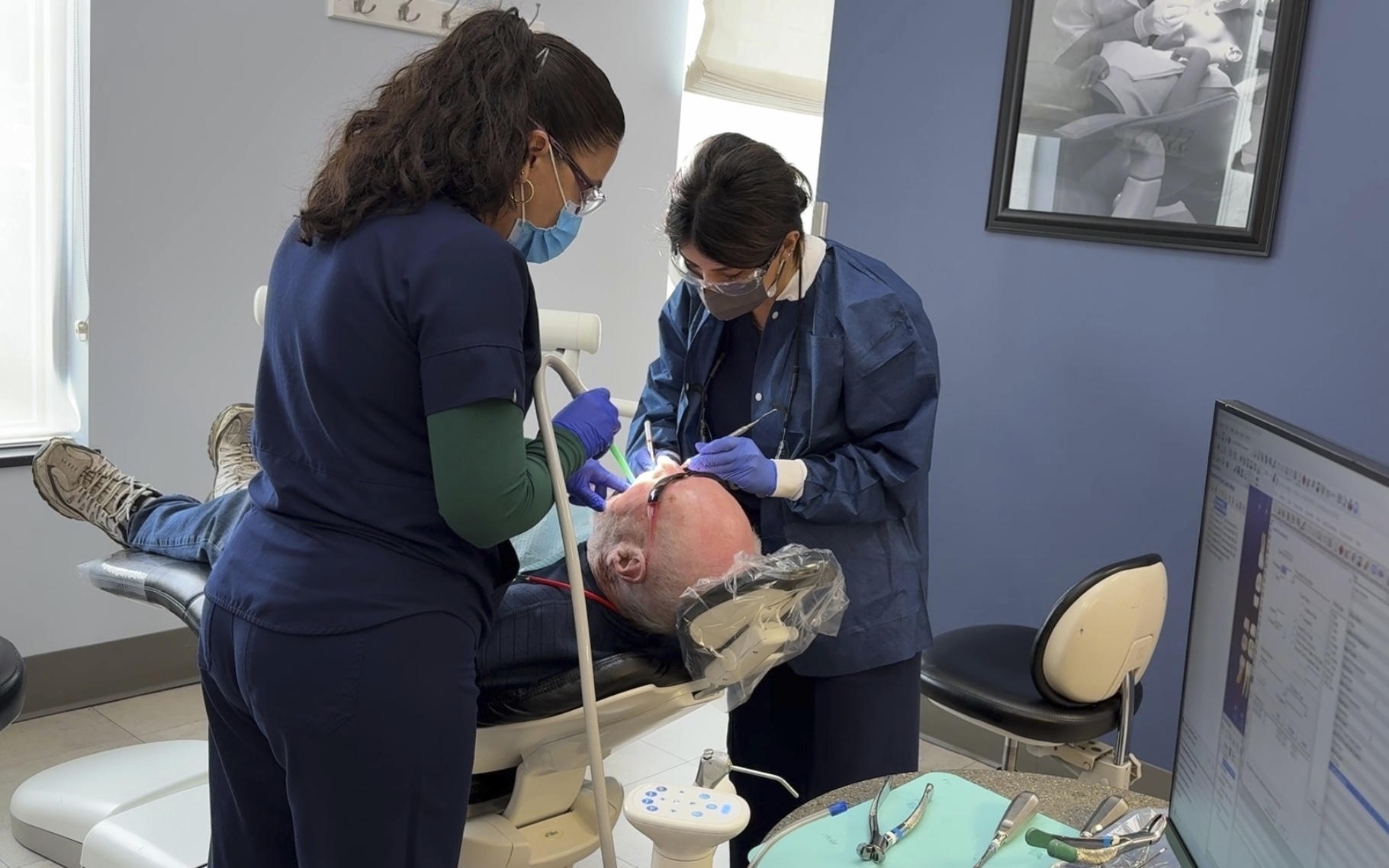 A patient receives a dental procedure at Salt Lake Donated Dental Services, a clinic serving low-income Utah residents on Monday. (AP Photo/Hannah Schoenbaum).