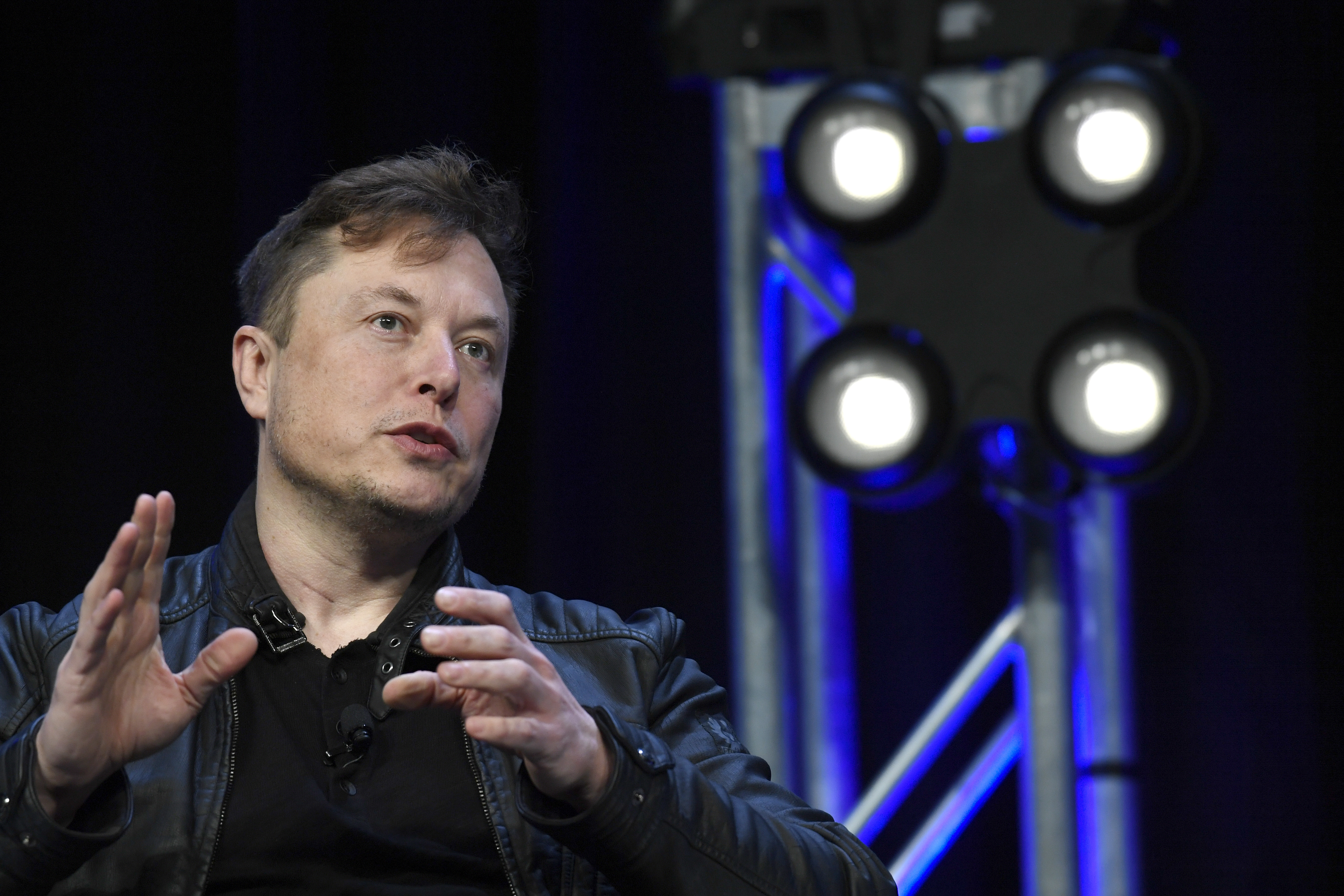 Tesla and SpaceX Chief Executive Officer Elon Musk speaks at the SATELLITE Conference and Exhibition in Washington in March 2020. (AP Photo/Susan Walsh, File).