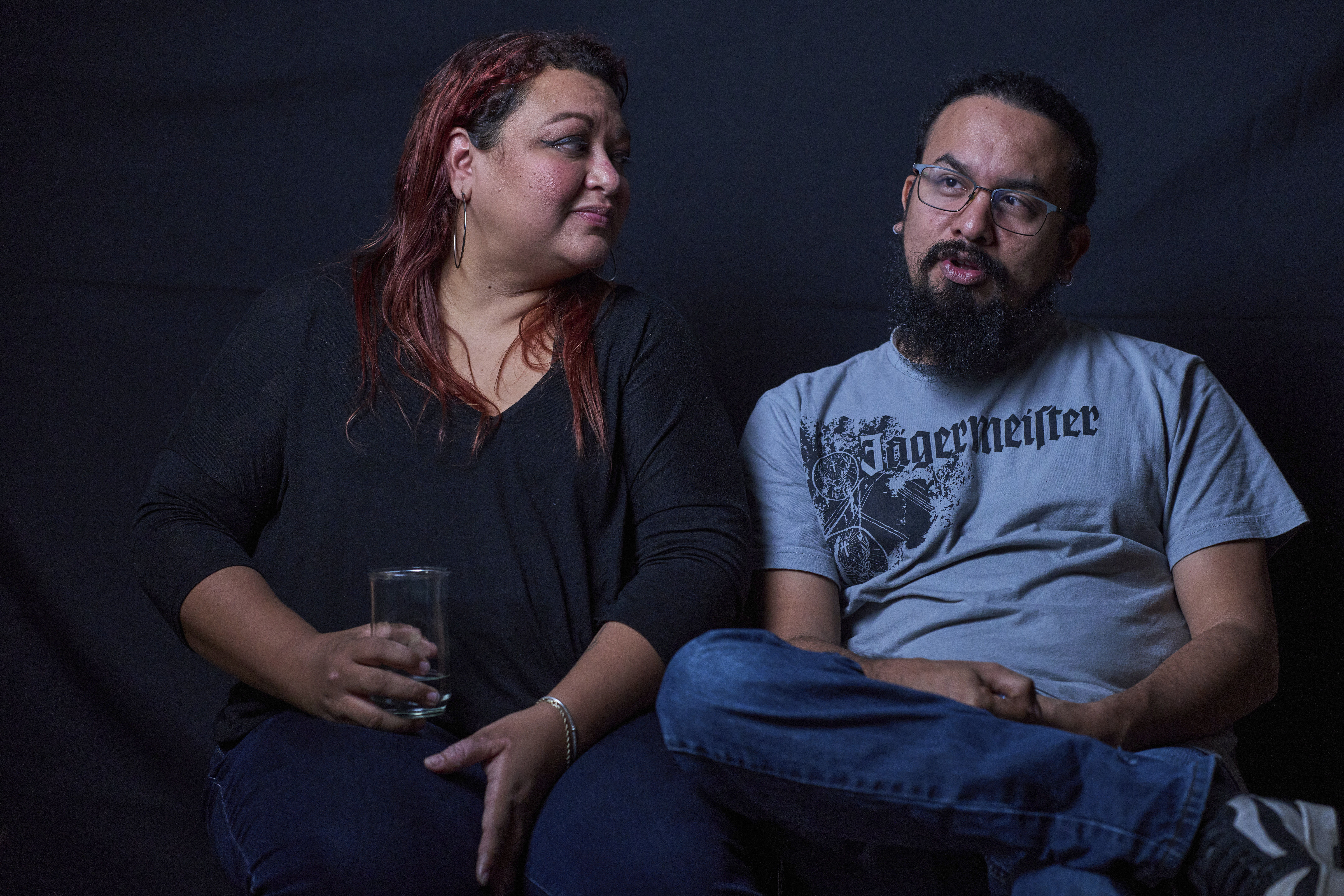 El Salvador journalist Monica Rodriguez, left, and her husband Steve Magaña, an activist, both of whom left the country fearing political persecution, give an interview on Friday. (AP Photo/Moises Castillo)