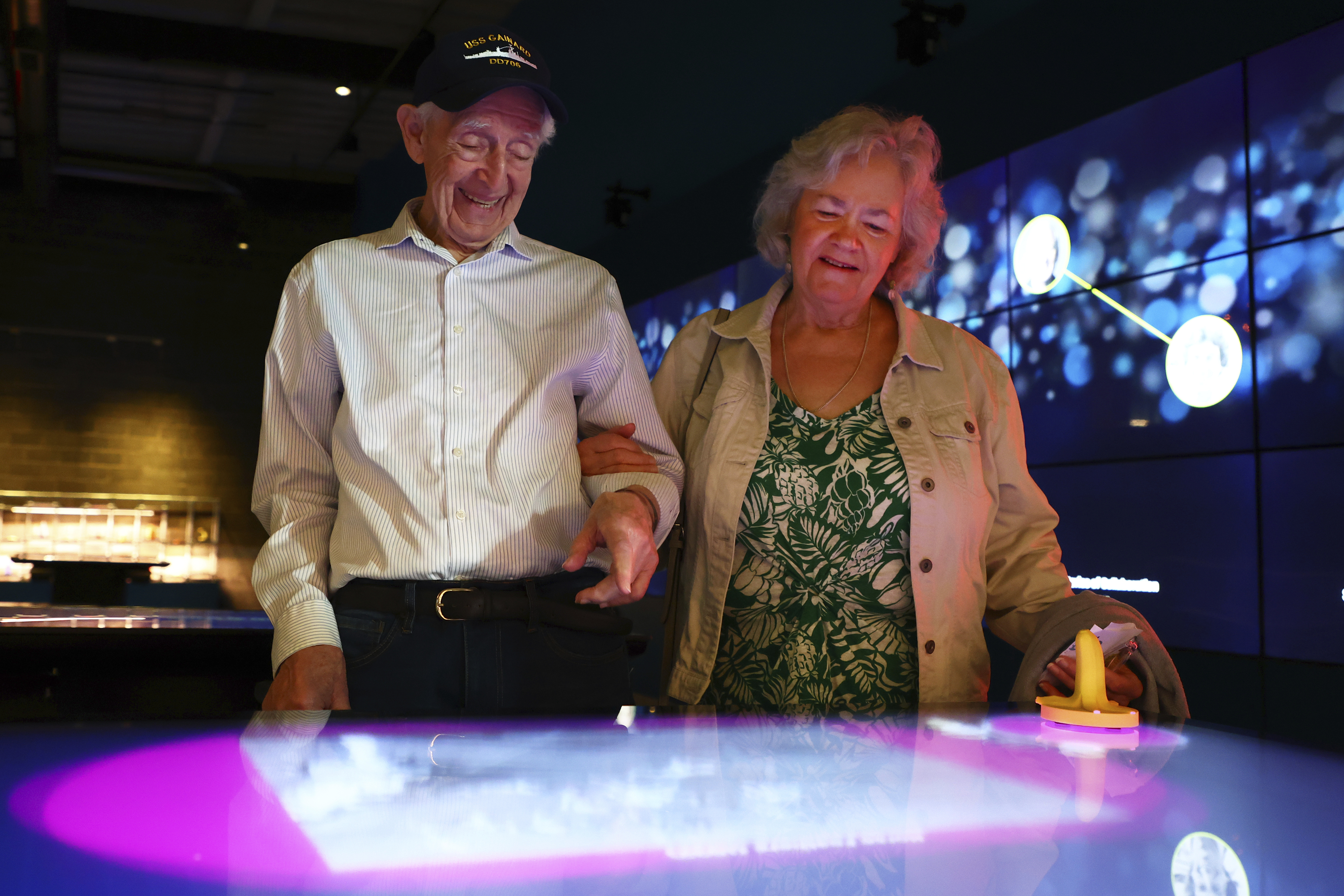 Mario and Gail Cirasunda, of Orchard Park, N.Y., interact with one of the museum's touch screen exhibits during a Memory Cafe event at the National Comedy Center Monday in May in Jamestown, N.Y. (AP Photo/Jeffrey T. Barnes).