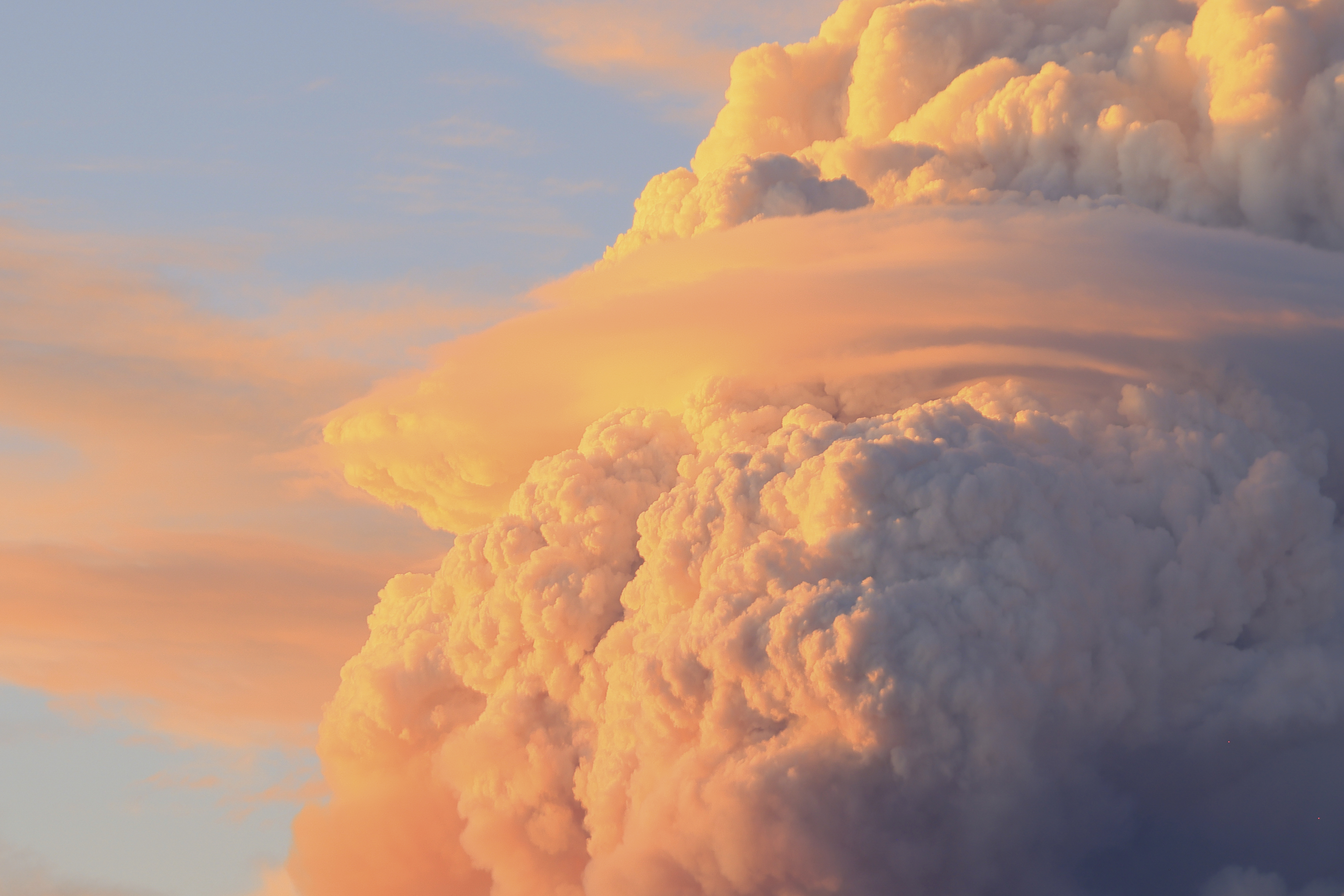 In this photo provided by Lin Chao, 'fire clouds' form near the Bright Angel Trailhead at the South Rim in the Grand Canyon, Ariz. on Sunday. (Lin Chao via AP).