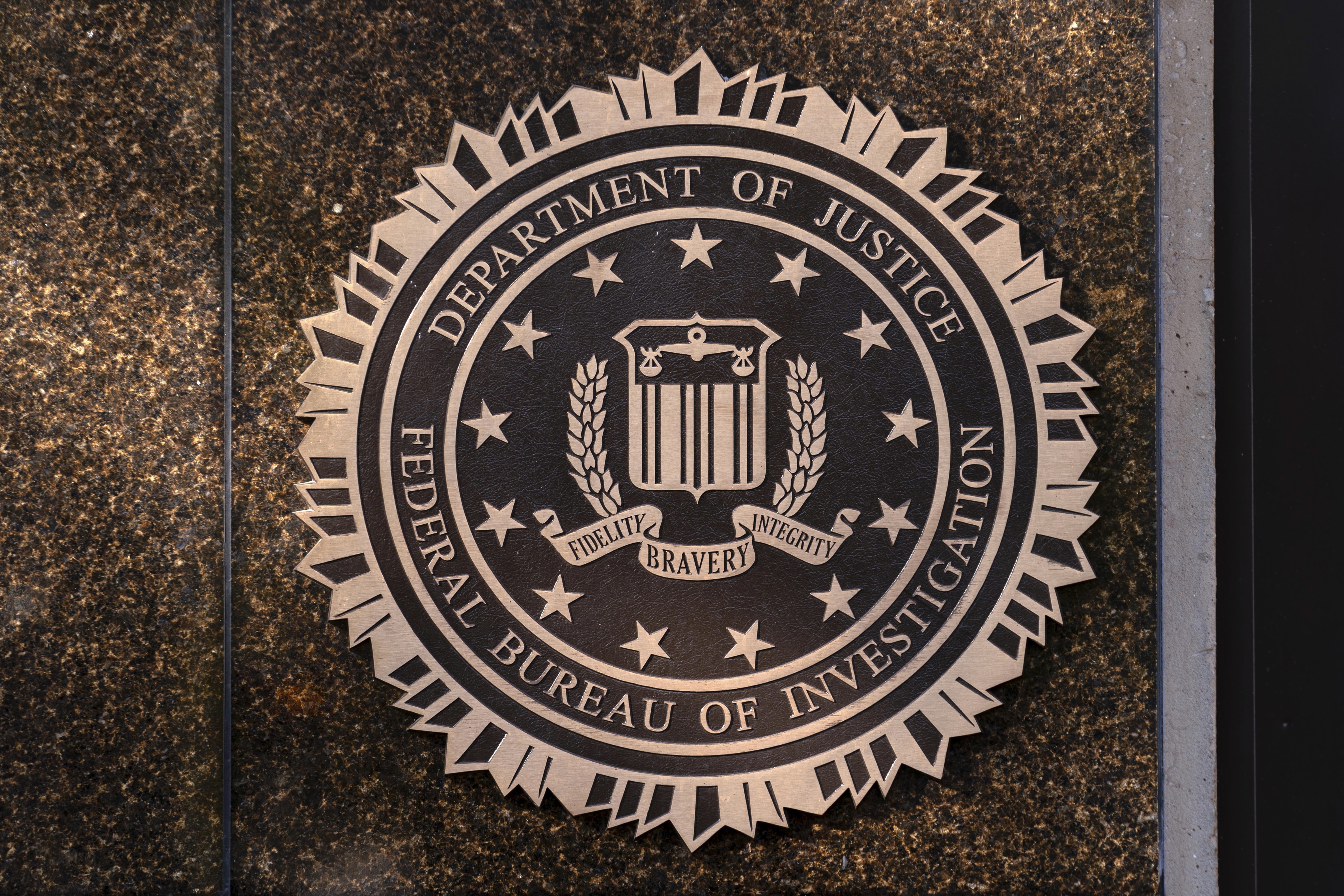 The seal of The Federal Bureau of Investigation is seen on the Headquarters in Washington, Nov. 18, 2024. (AP Photo/Jose Luis Magana, File)