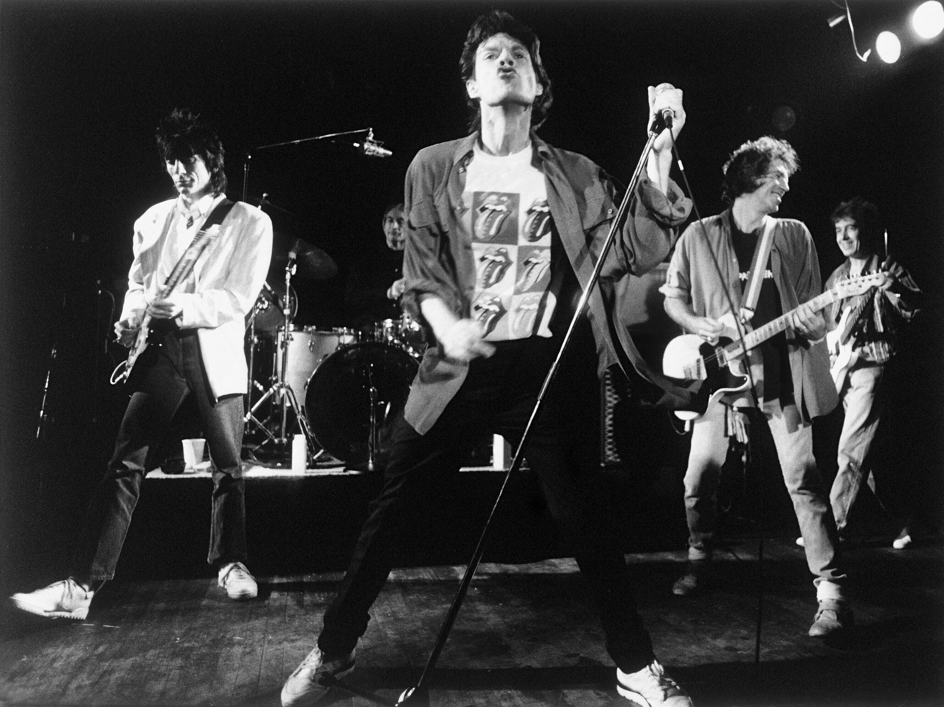 The Rolling Stones perform during an impromptu concert at Toad's Place nightclub in New Haven, Conn., in 1989. (AP Photo/Dimo Safari).