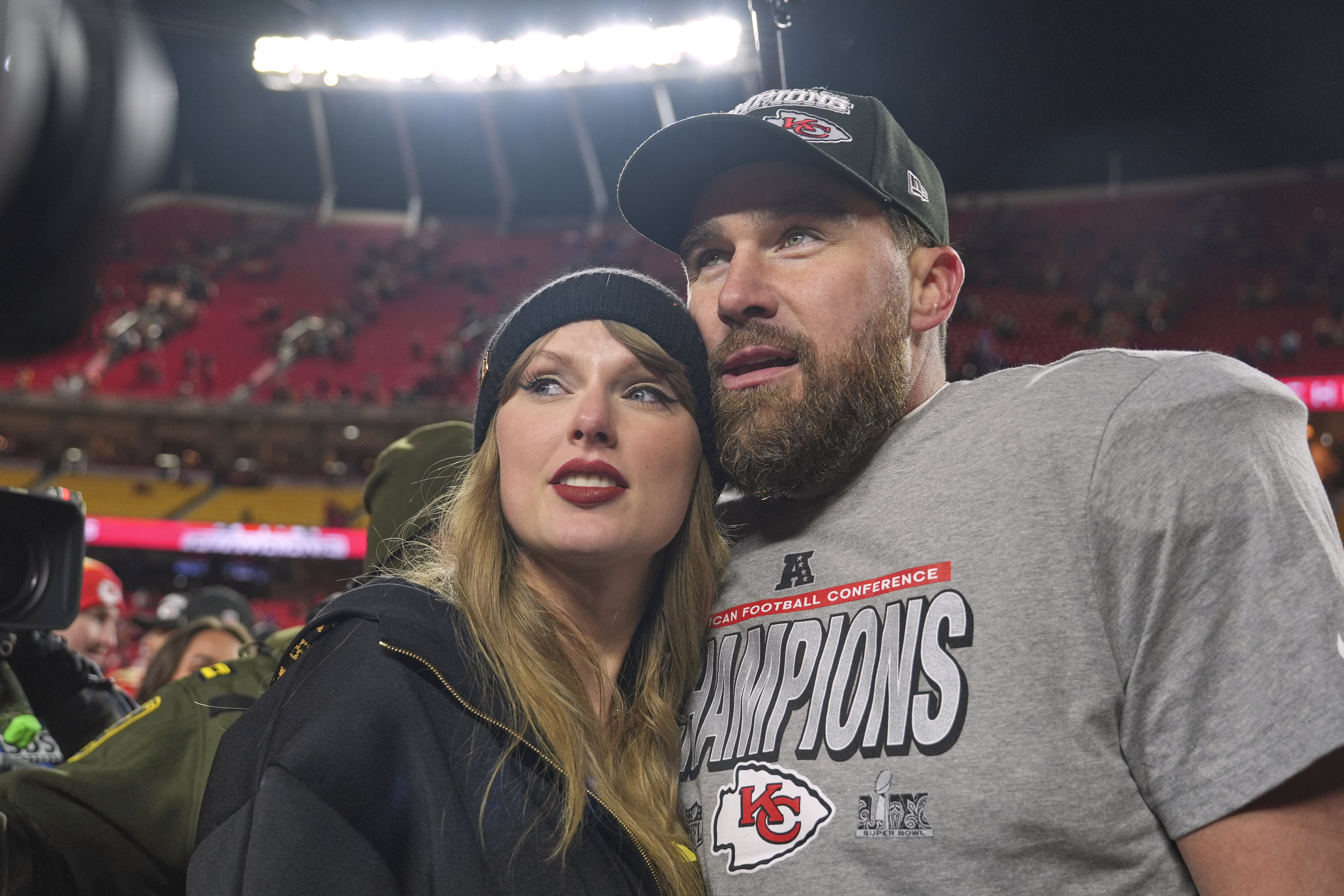  Kansas City Chiefs tight end Travis Kelce, right, appears with singer Taylor Swift after the Chiefs victory over the Buffalo Bills in the AFC Championship game in Kansas City, Mo., on Jan. 26, 2025. (AP Photo/Charlie Riedel, File)
