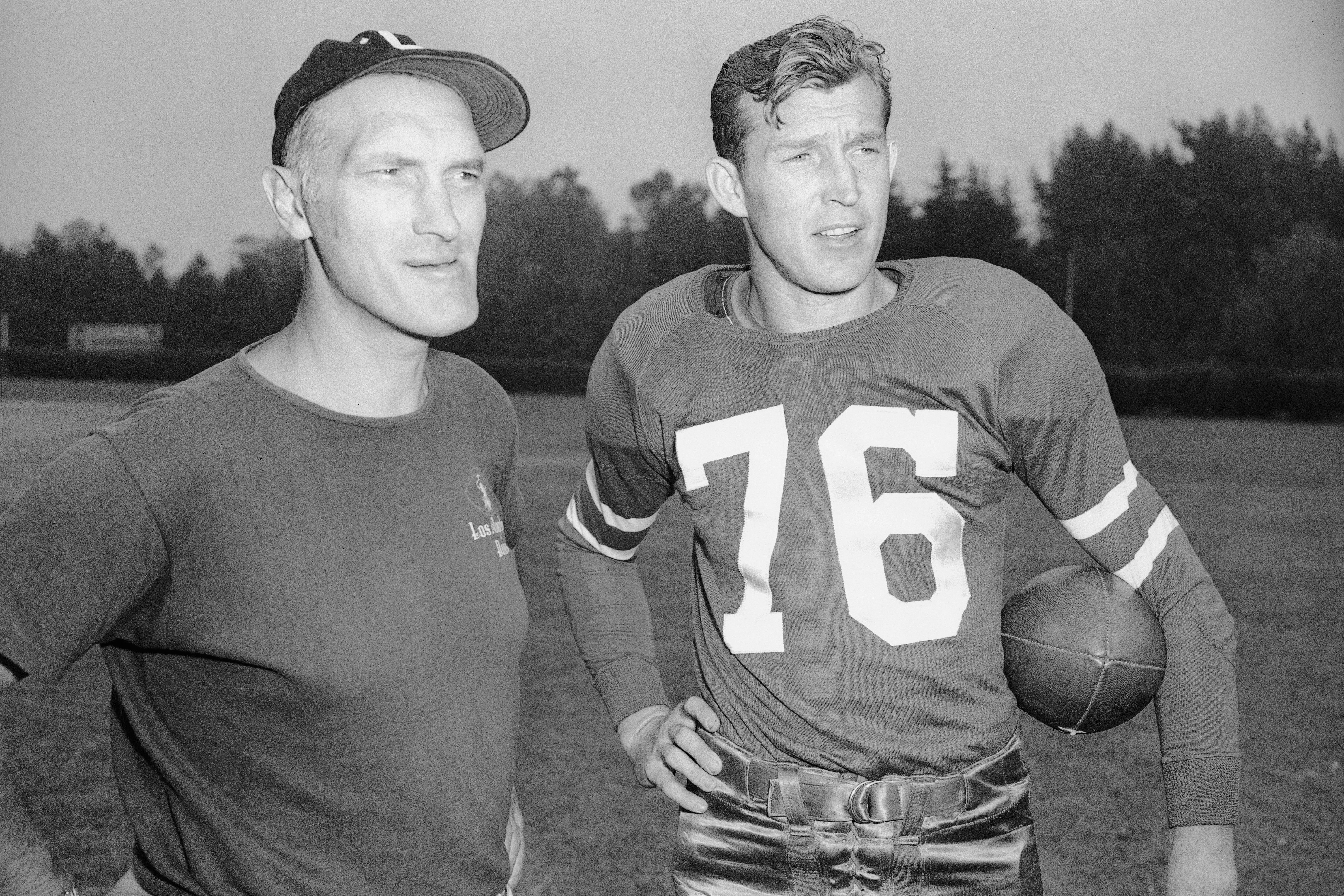 Glenn Dobbs Jr., right, stands with Los Angeles Dons football coach Dud DeGroot in Los Angeles in 1947. (AP Photo/Ira W. Guldner).