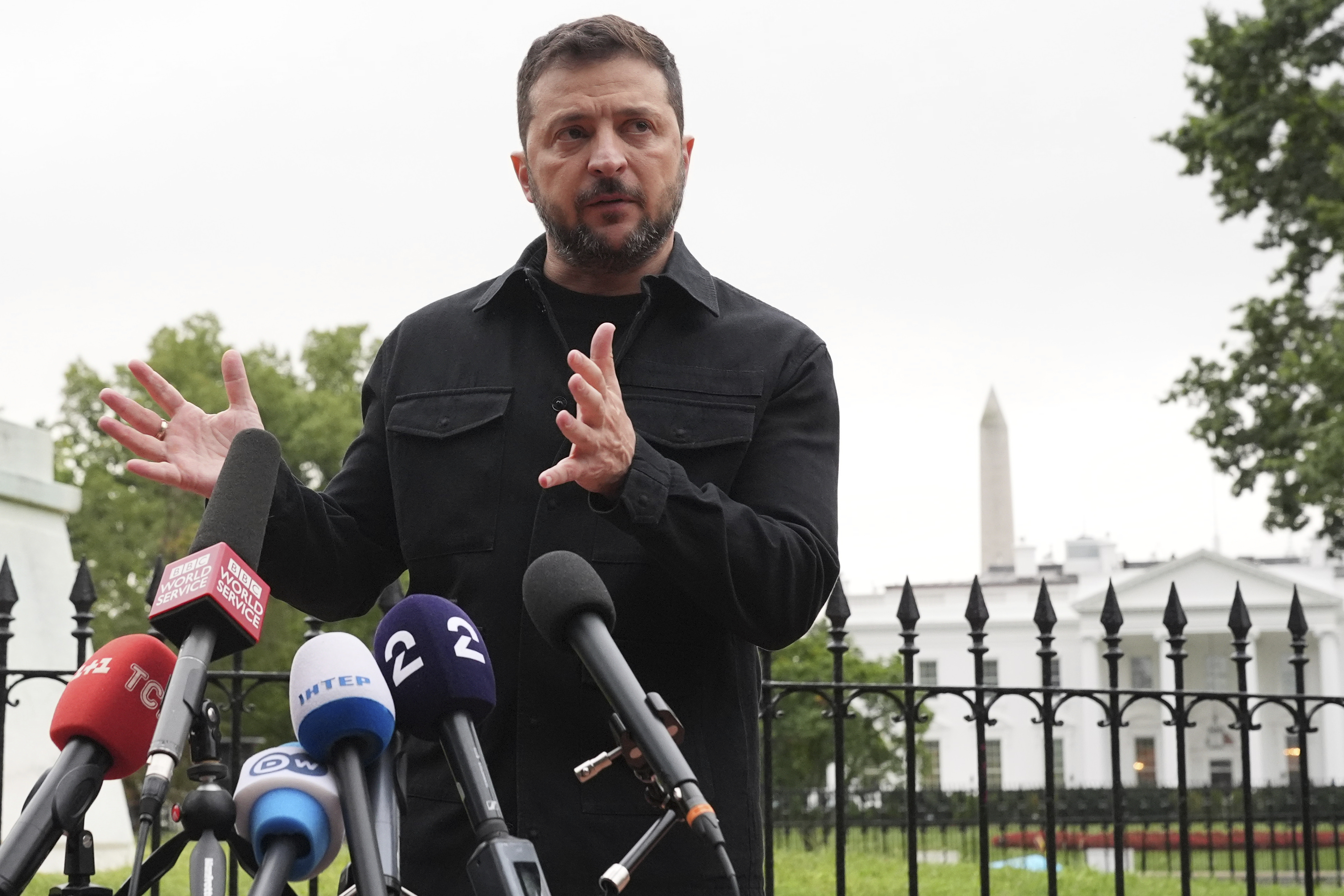 Ukraine's President Volodymyr Zelenskyy speaks in Lafayette Park, across from the White House, after meeting with President Donald Trump and European leaders Monday. (AP Photo/Jacquelyn Martin)