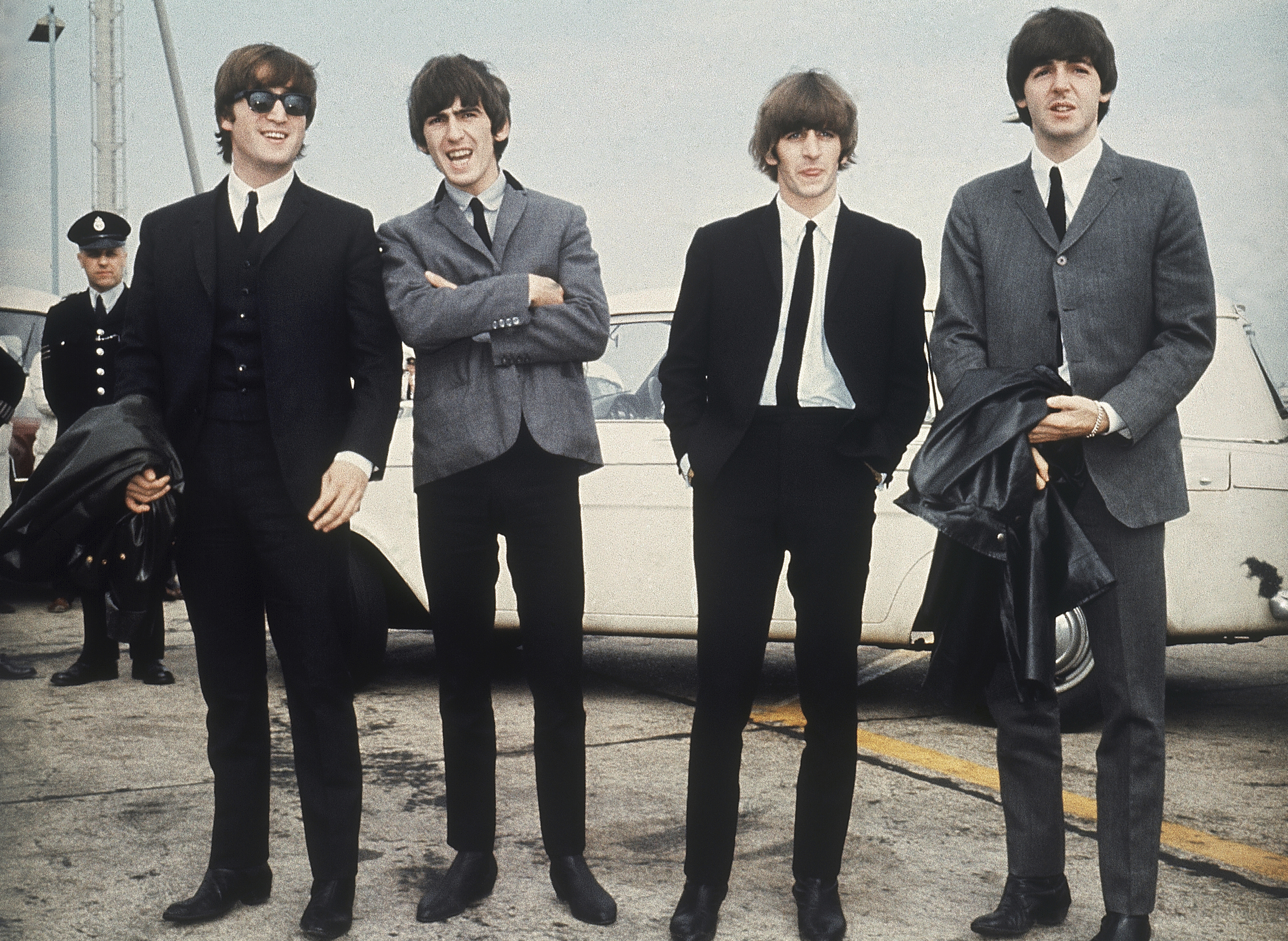 The Beatles, from left, John Lennon, George Harrison, Ringo Starr and Paul McCartney arrive in Liverpool, England, July 10, 1964. (AP Photo).