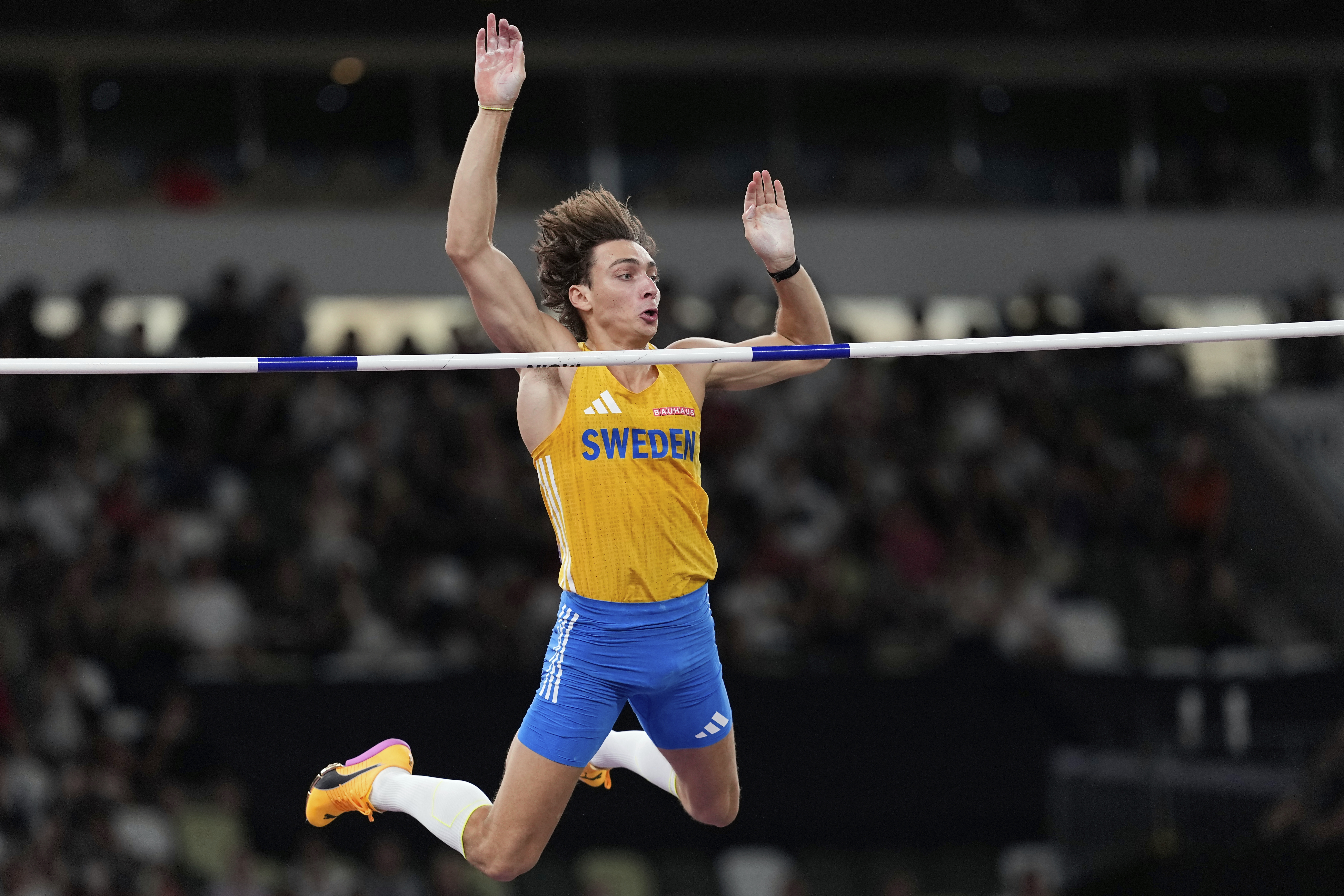 Sweden's Armand Duplantis clears the bar to set a new men's pole vault world record of 6.30 meters, at the World Athletics Championships in Tokyo on Monday. (AP Photo/Matthias Schrader).