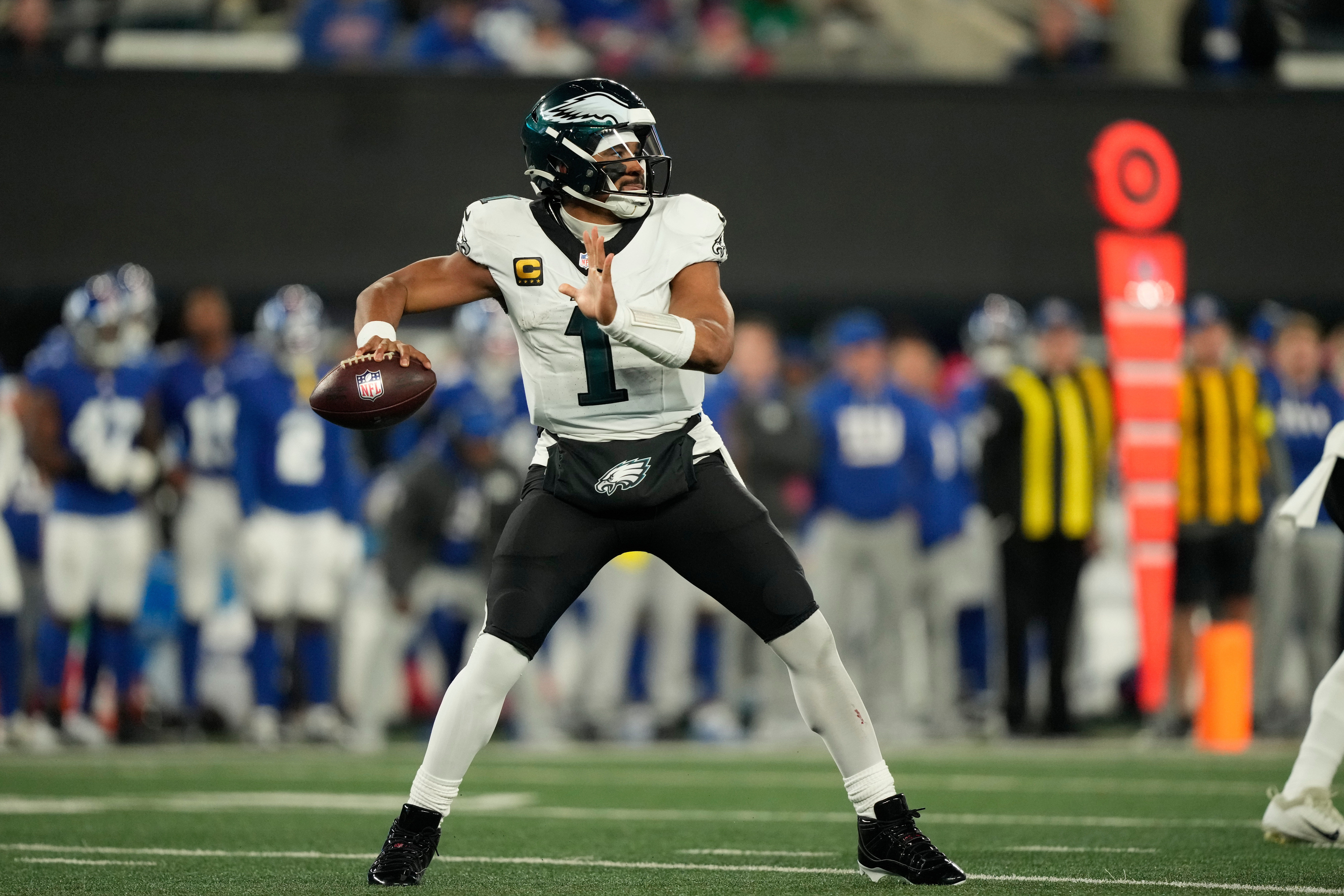 Philadelphia Eagles' Jalen Hurts plays during the second half of an NFL football game against the New York Giants Thursday in East Rutherford, N.J. (AP Photo/Yuki Iwamura).