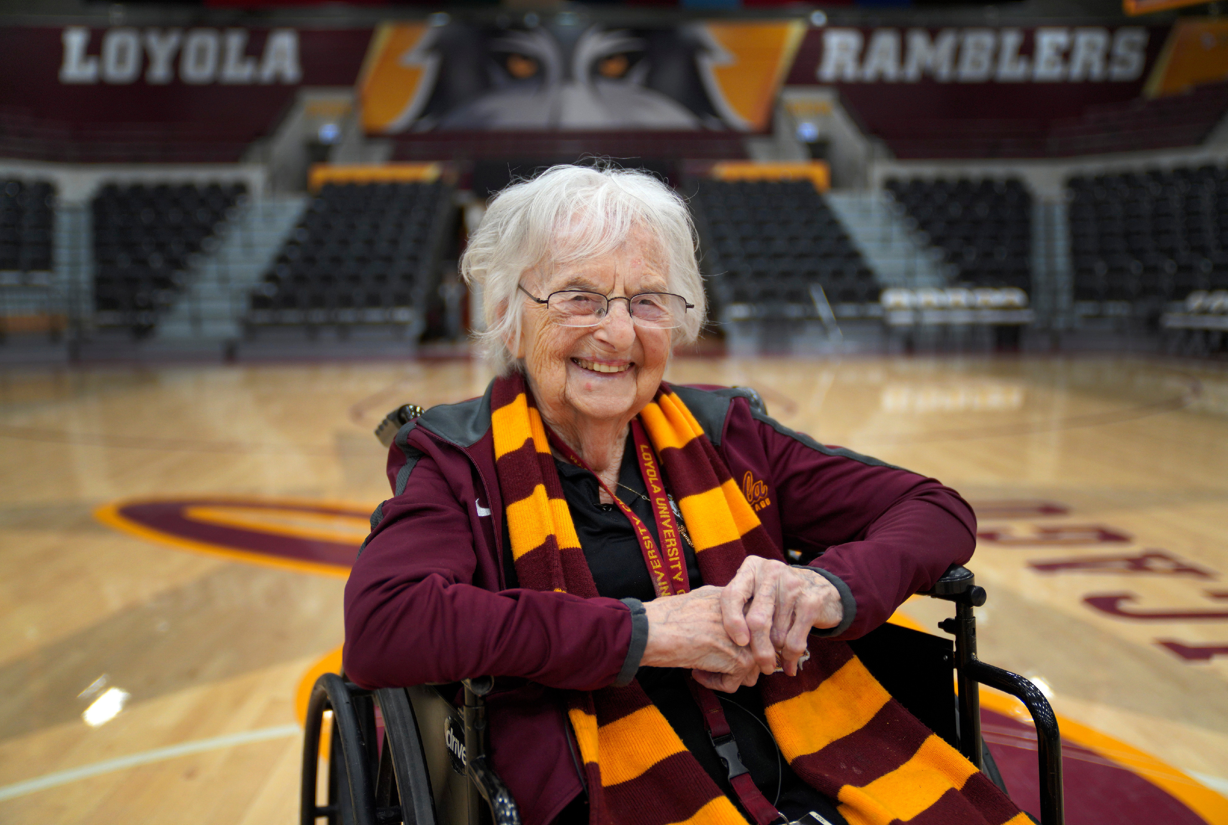 Sister Jean Dolores Schmidt, the Loyola University men's basketball chaplain and school celebrity, sits for a portrait in The Joseph J. Gentile Arena, Jan. 23, 2023, in Chicago. (AP Photo/Jessie Wardarski).