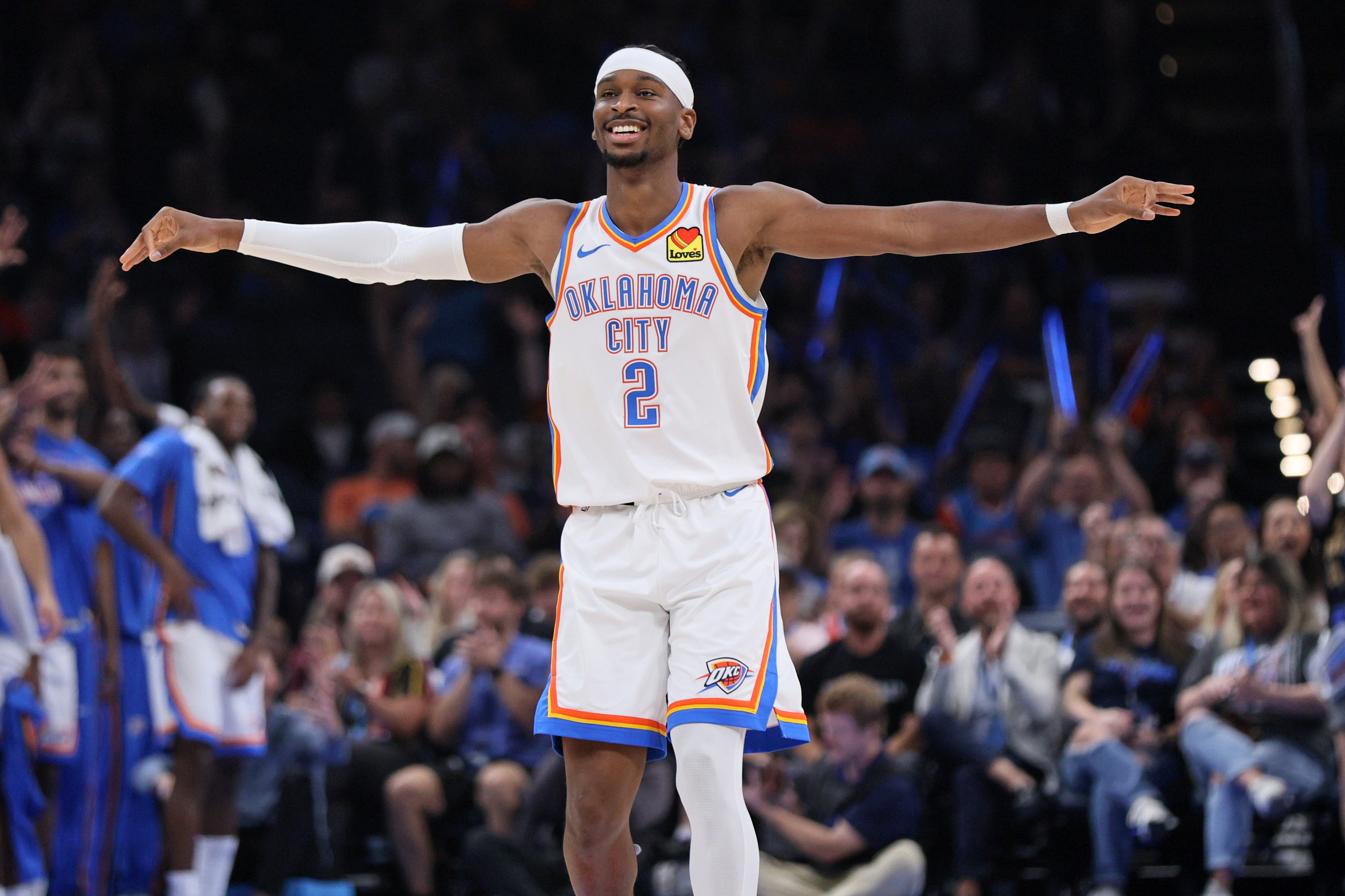 Oklahoma City Thunder guard Shai Gilgeous-Alexander reacts after a teammate scored during the first half of a preseason NBA basketball game against the Charlotte Hornets, Thursday, Oct. 9, 2025, in Oklahoma City. (AP Photo/Nate Billings)