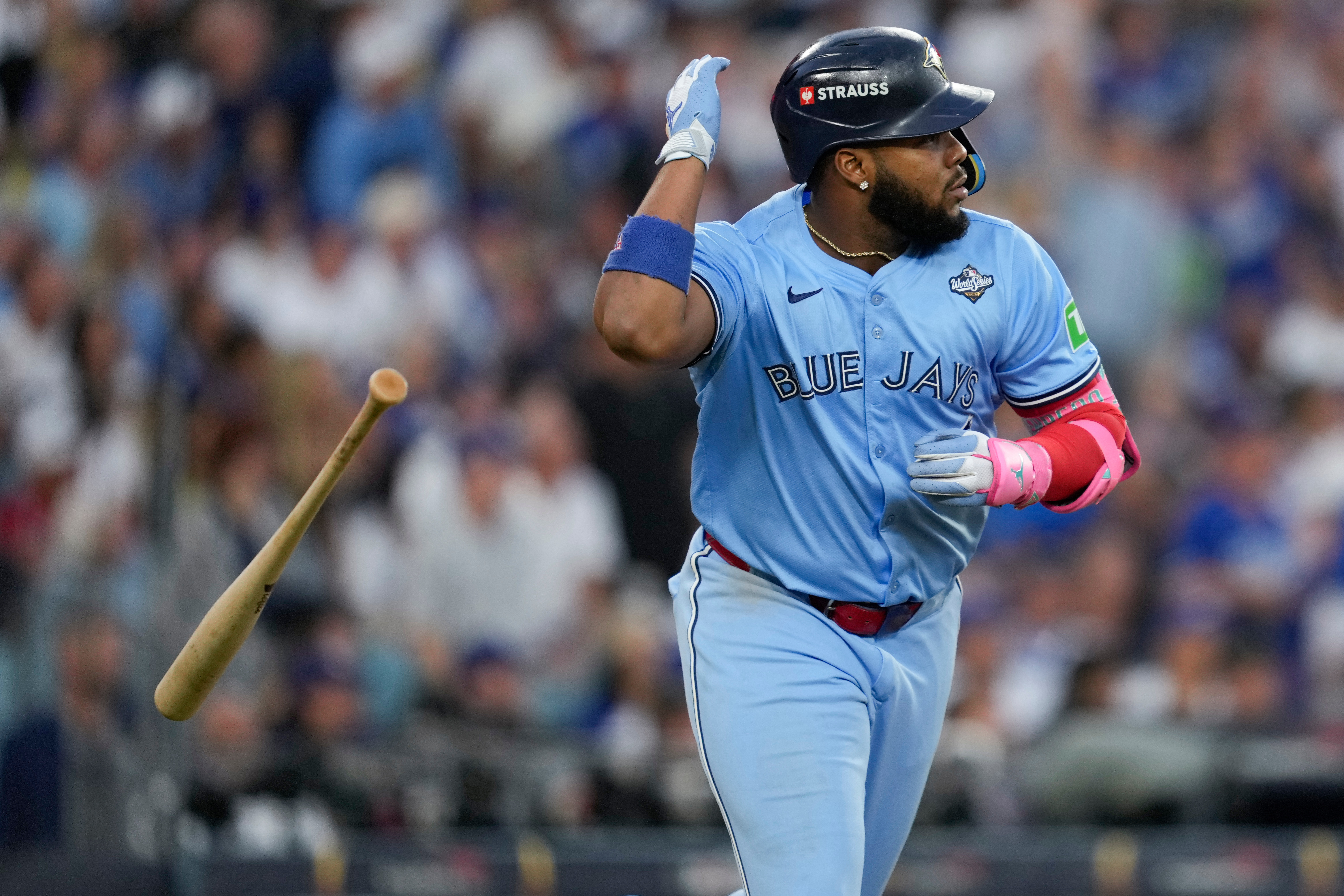 Toronto Blue Jays' Vladimir Guerrero Jr. flips his bat after hitting a two run against the Los Angeles Dodgers during the third inning in Game 4 of baseball's World Series, Tuesday, in Los Angeles.