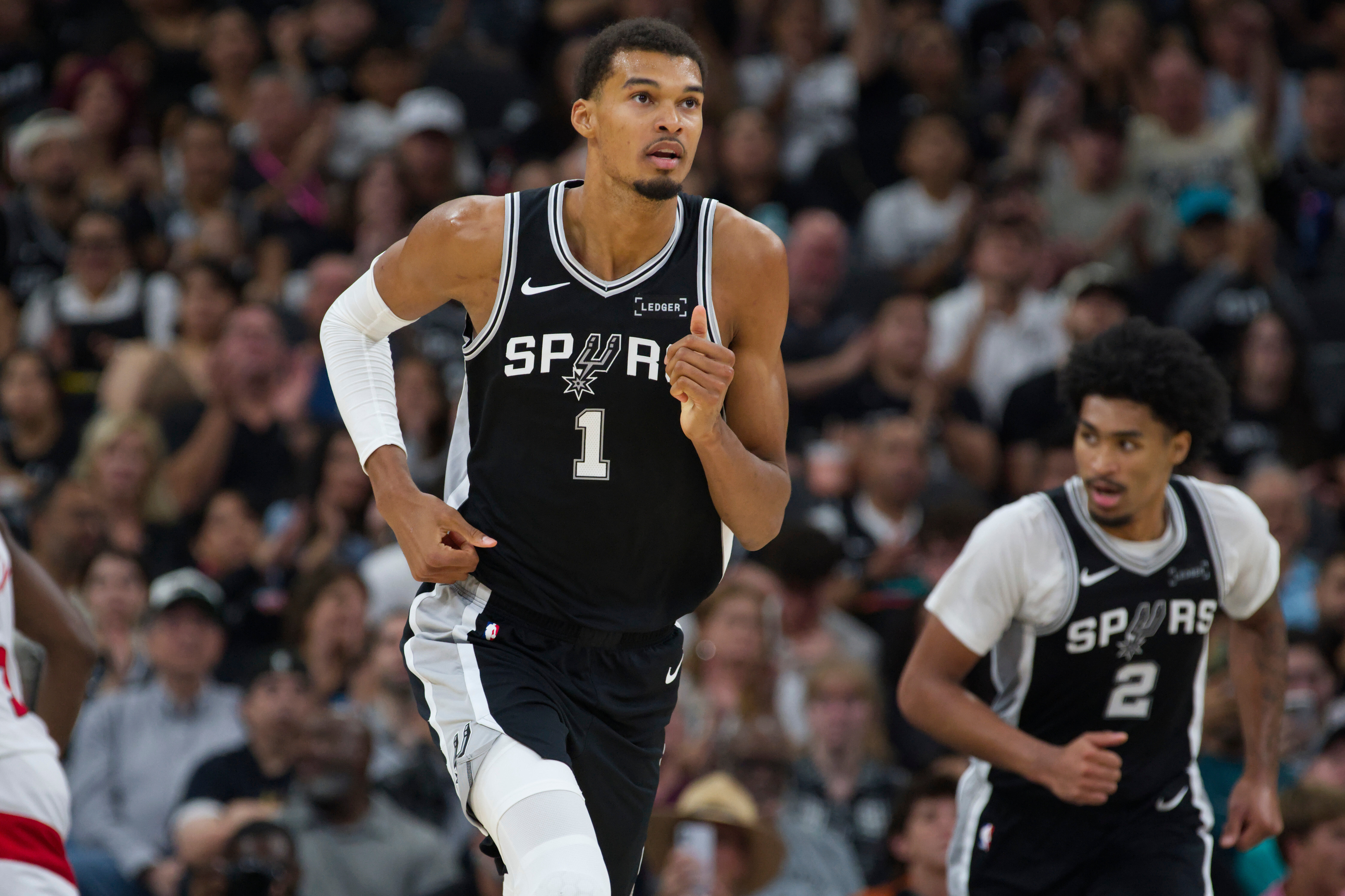 San Antonio Spurs center Victor Wembanyama (1) runs up-court during the second half of an NBA basketball game against the Toronto Raptors, Monday, in San Antonio.