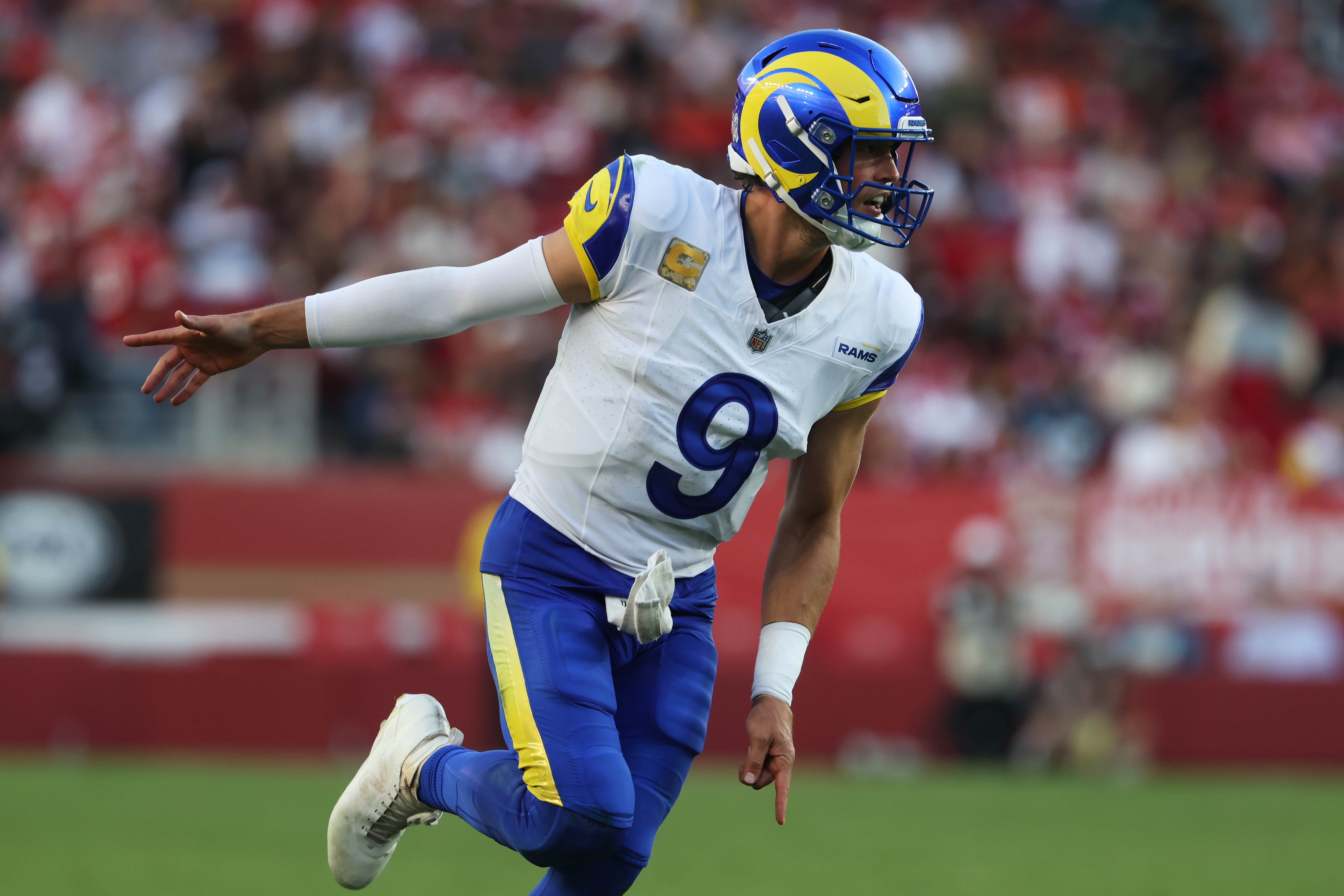 Los Angeles Rams quarterback Matthew Stafford (9) celebrates after throwing a touchdown pass to tight end Colby Parkinson during the second half of an NFL football game against the San Francisco 49ers in Santa Clara, Calif., Sunday, Nov. 9, 2025.