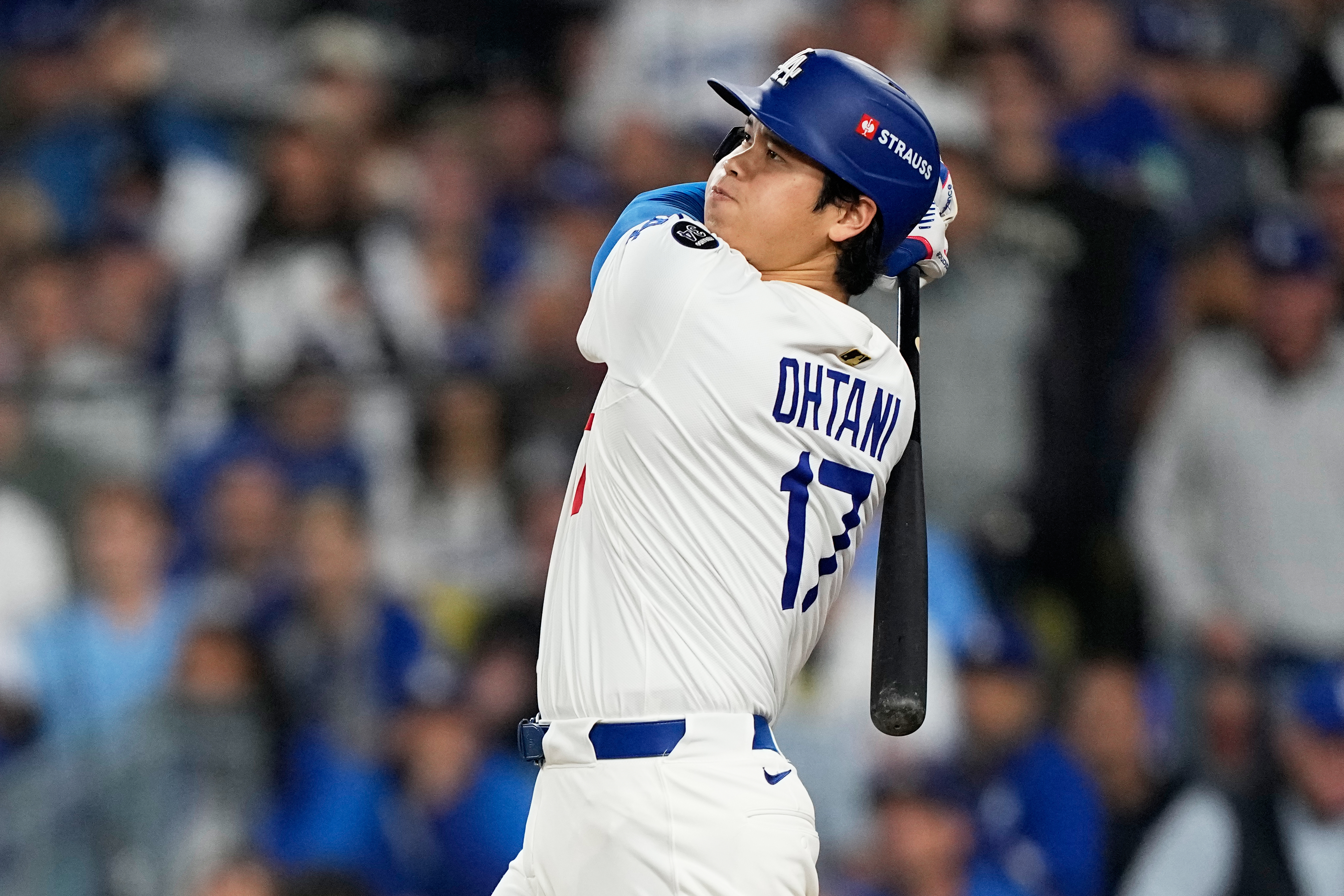 FILE - Los Angeles Dodgers' Shohei Ohtani watches his home run against the Toronto Blue Jays during the seventh inning in Game 3 of baseball's World Series, Monday, Oct. 27, 2025, in Los Angeles.