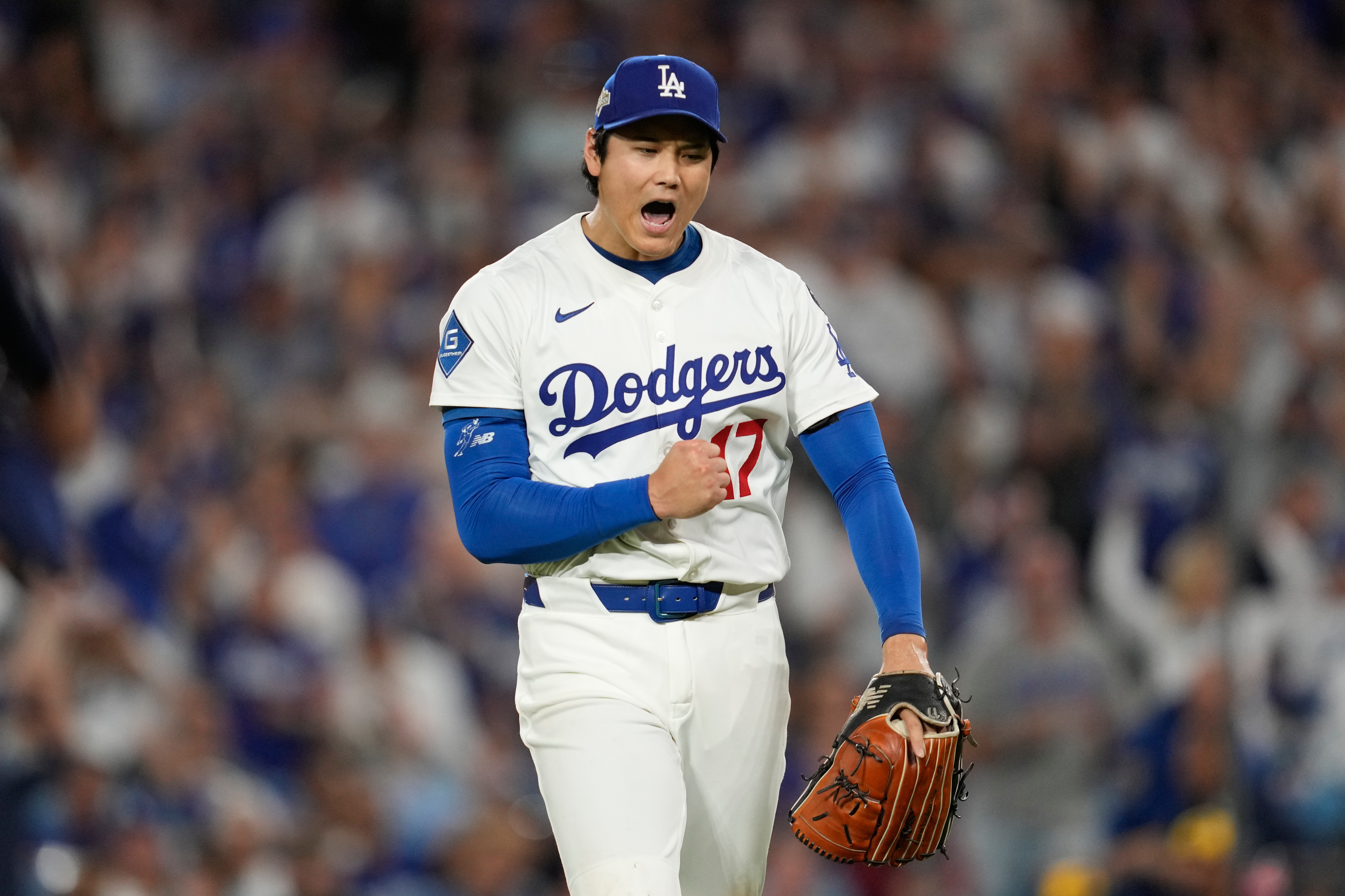 FILE - Los Angeles Dodgers pitcher Shohei Ohtani (17) reacts during Game 4 of baseball's National League Championship Series against the Milwaukee Brewers, Friday, Oct. 17, 2025, in Los Angeles.
