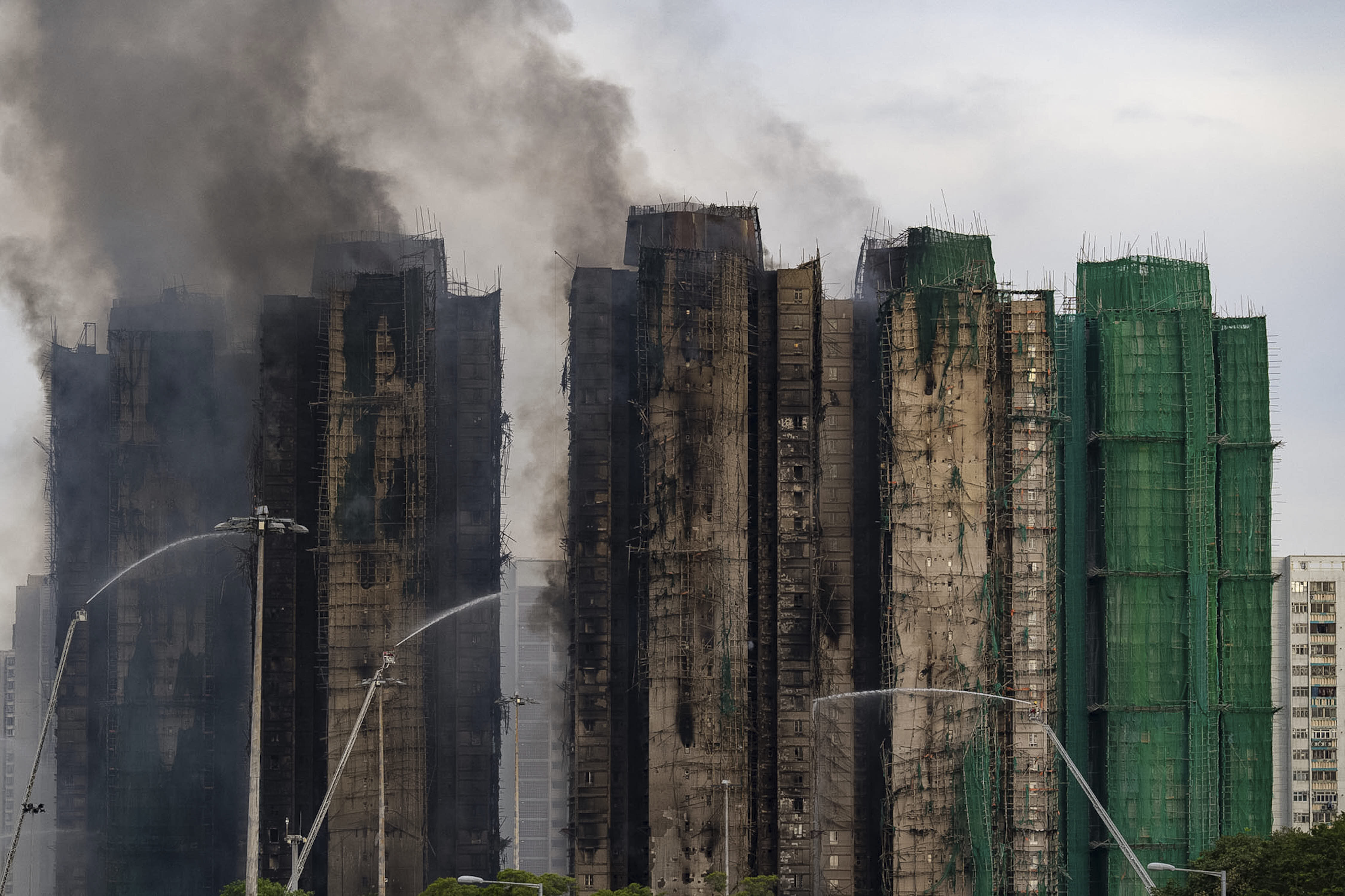 Firefighters continue to battle the deadly blaze at the Wang Fuk Court high-rise apartment complex in Hong Kong.