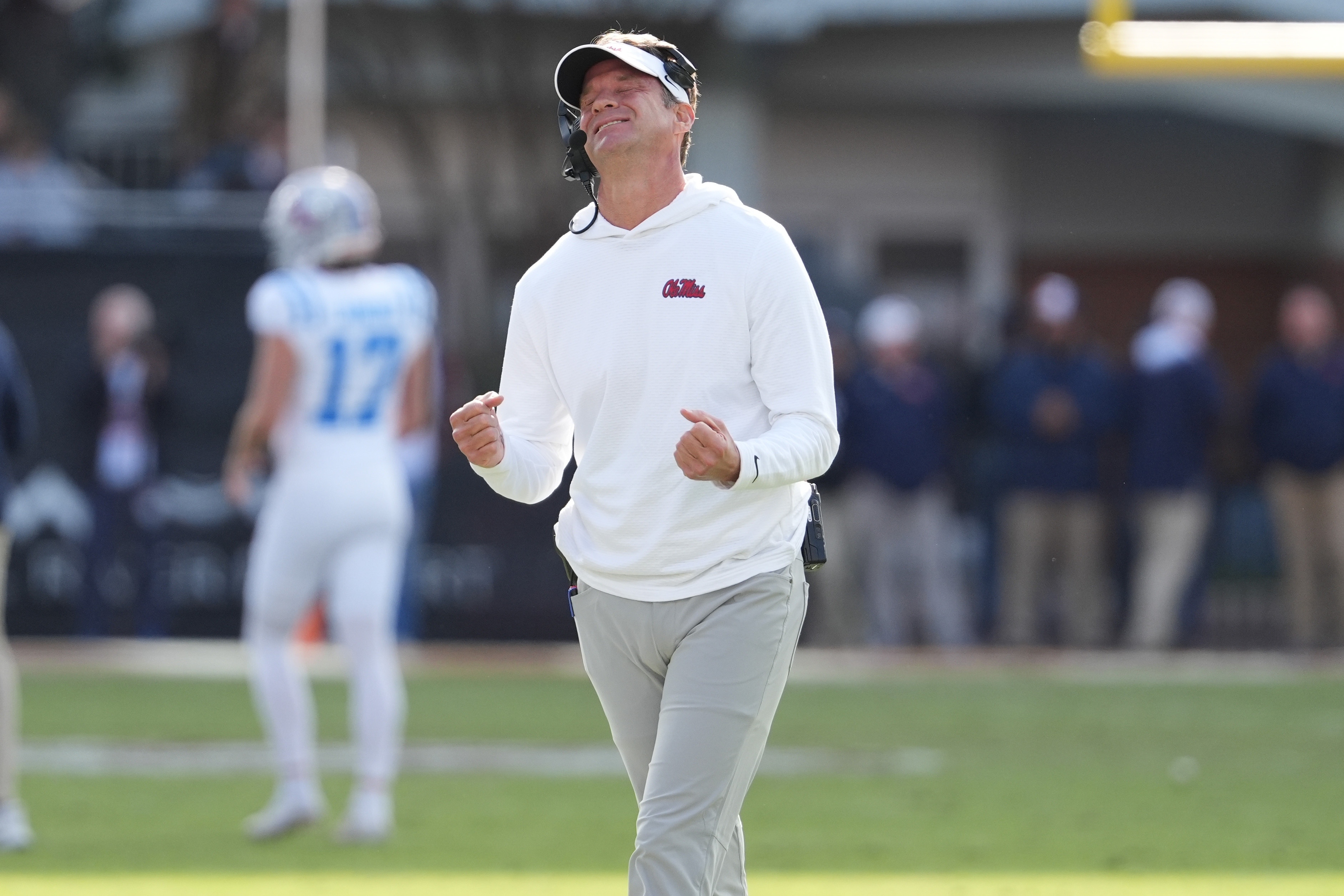 Mississippi head coach Lane Kiffin reacts to a official's call during the second half of an NCAA college football game against Mississippi State, Friday, Nov. 28, 2025, in Starkville, Miss. (AP Photo/Rogelio V. Solis)