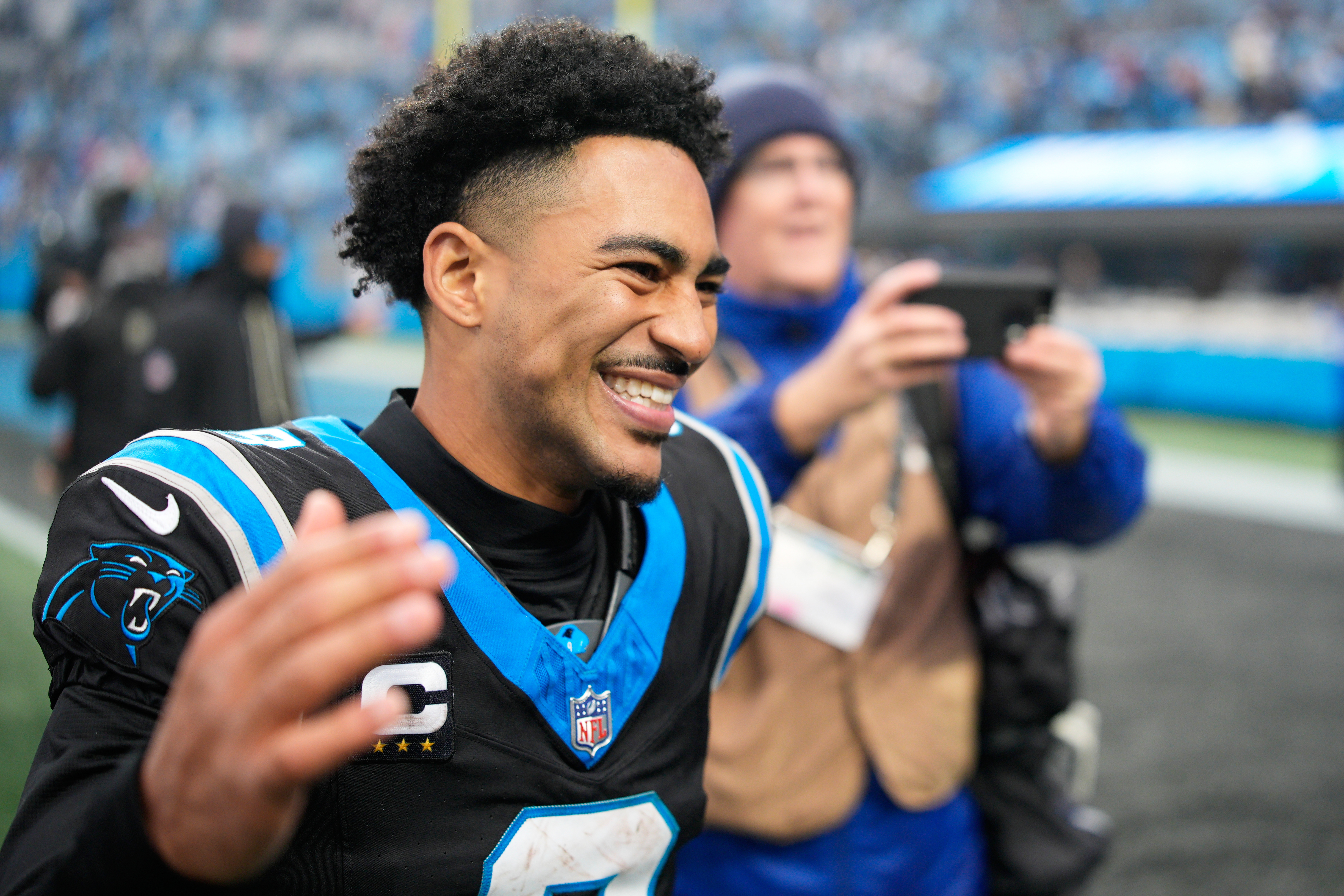 Carolina Panthers quarterback Bryce Young celebrates after an NFL football game between the Carolina Panthers and the Los Angeles Rams, Sunday, Nov. 30, 2025, in Charlotte, N.C. (AP Photo/Jacob Kupferman)
