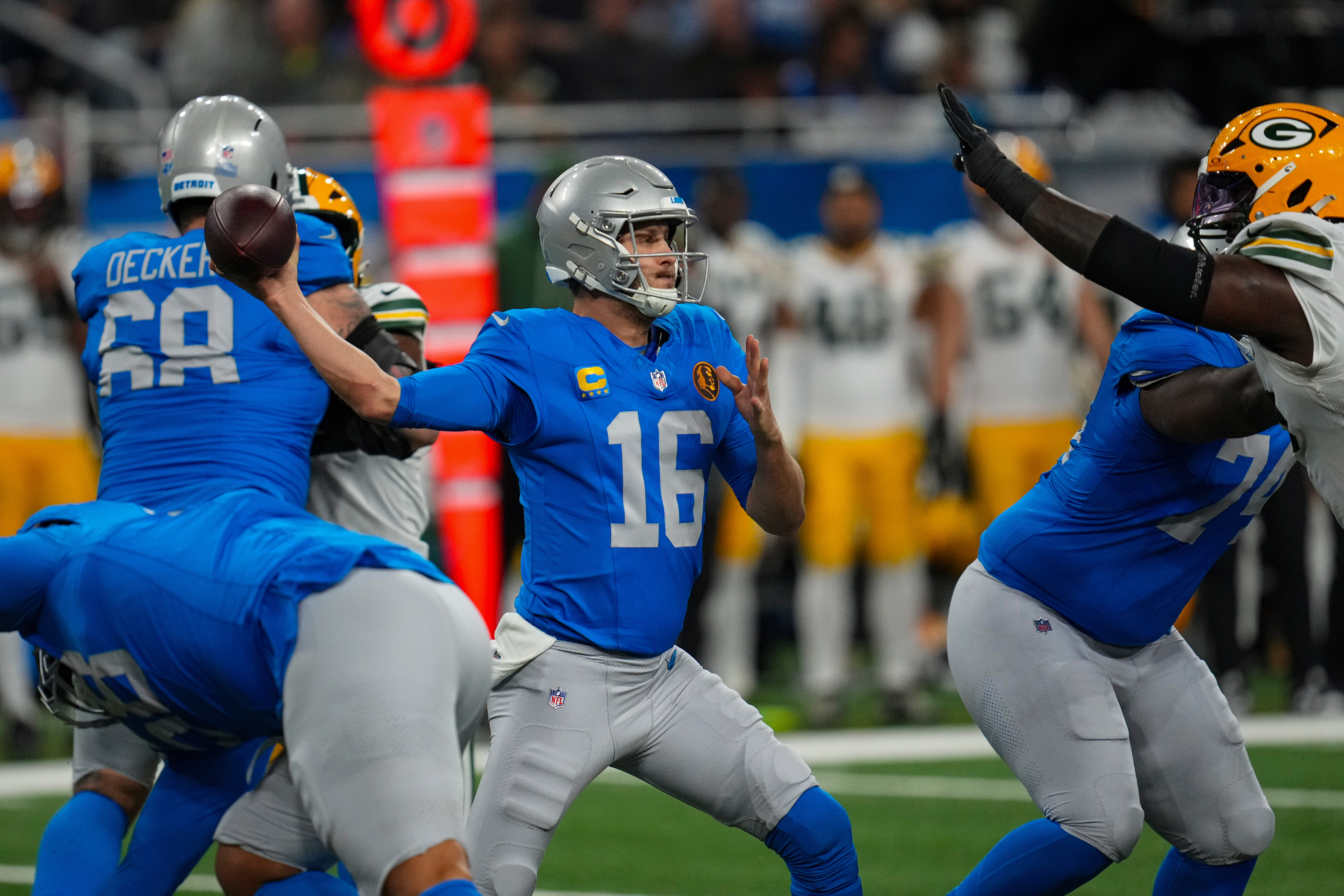 Detroit Lions quarterback Jared Goff (16) throws against the Green Bay Packers during the first half an NFL football game in Detroit, Thursday, Nov. 27, 2025. (AP Photo/Paul Sancya)
