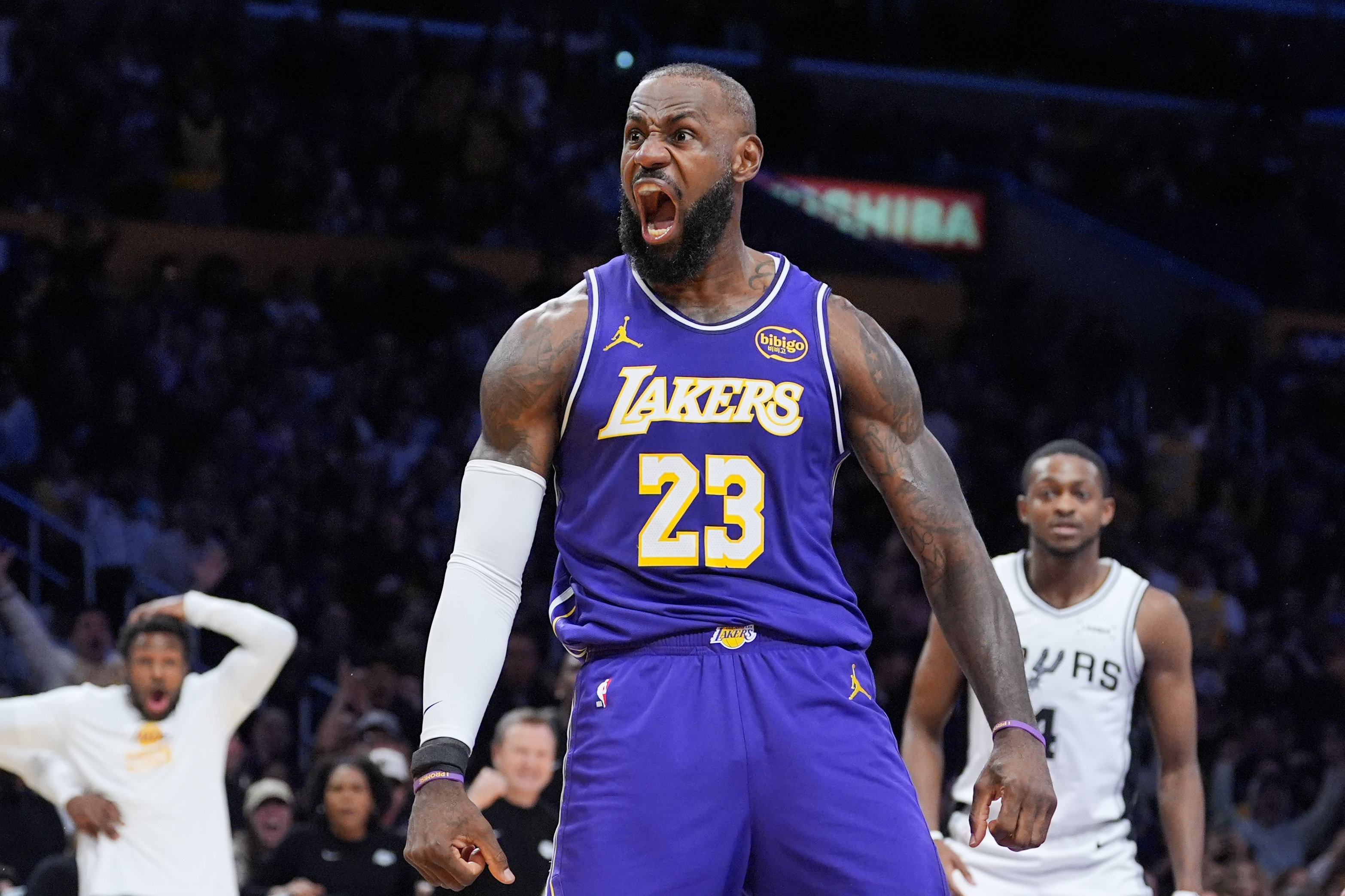 Los Angeles Lakers forward Lebron James (23) reacts after making a dunk during the first half of an NBA Cup basketball game against the San Antonio Spurs Wednesday, Dec. 10, 2025, in Los Angeles.