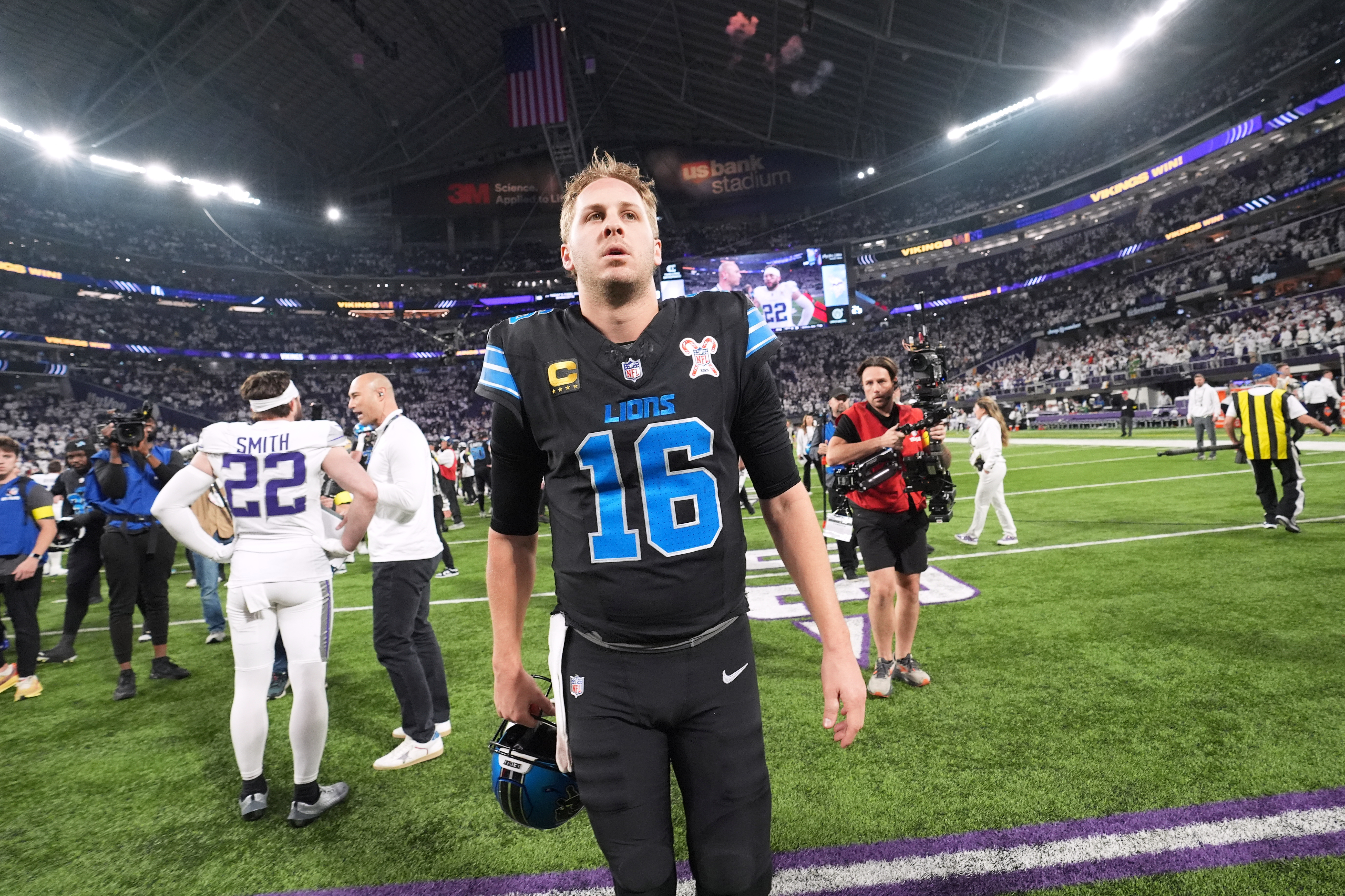 Detroit Lions quarterback Jared Goff walks off the field after the team's loss to the Minnesota Vikings in an NFL football game, Thursday in Minneapolis. (AP Photo/Abbie Parr).