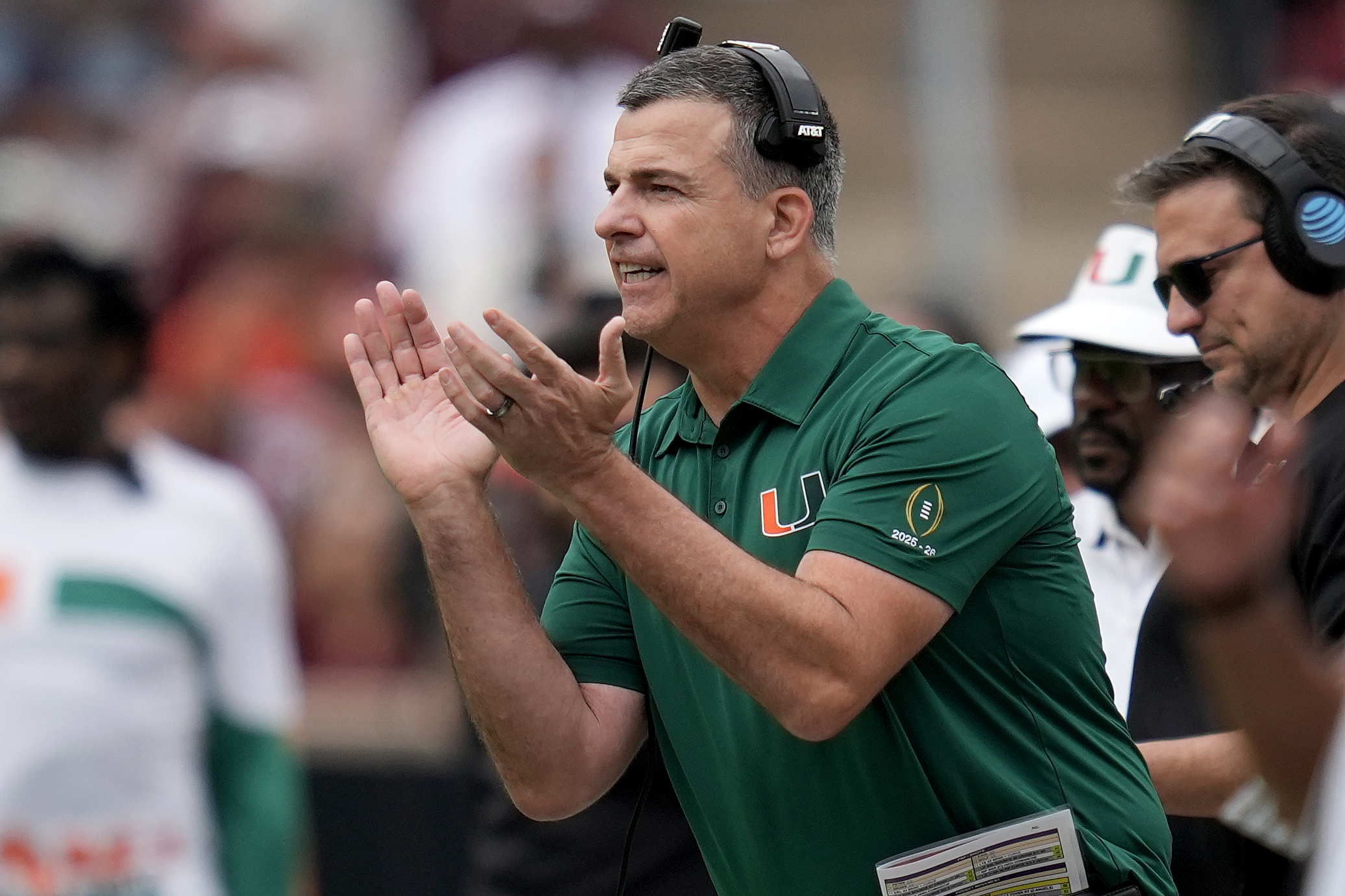 Miami head coach Mario Cristobal reacts to a play against Texas A&M during the first quarter in the first round of the NCAA College Football Playoff, Saturday in College Station, Texas. (AP Photo/Sam Craft).