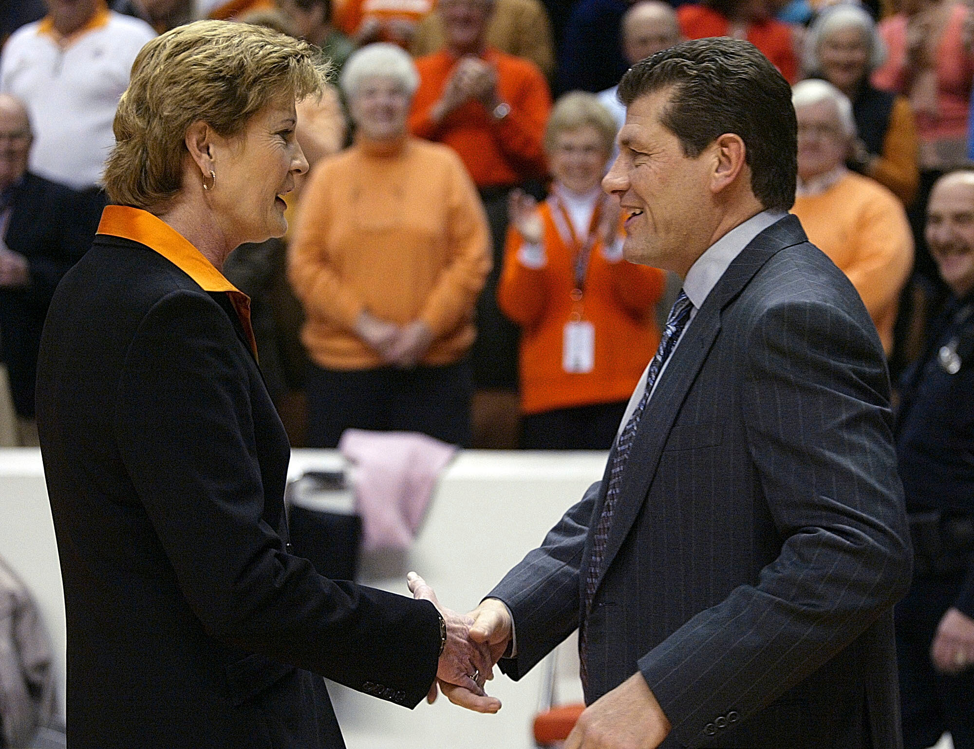 FILE - Tennessee coach Pat Summitt, left, shakes hand with Connecticut coach Geno Auriemma before a women's college basketball game, Jan. 7, 2006, in Knoxville, Tenn.