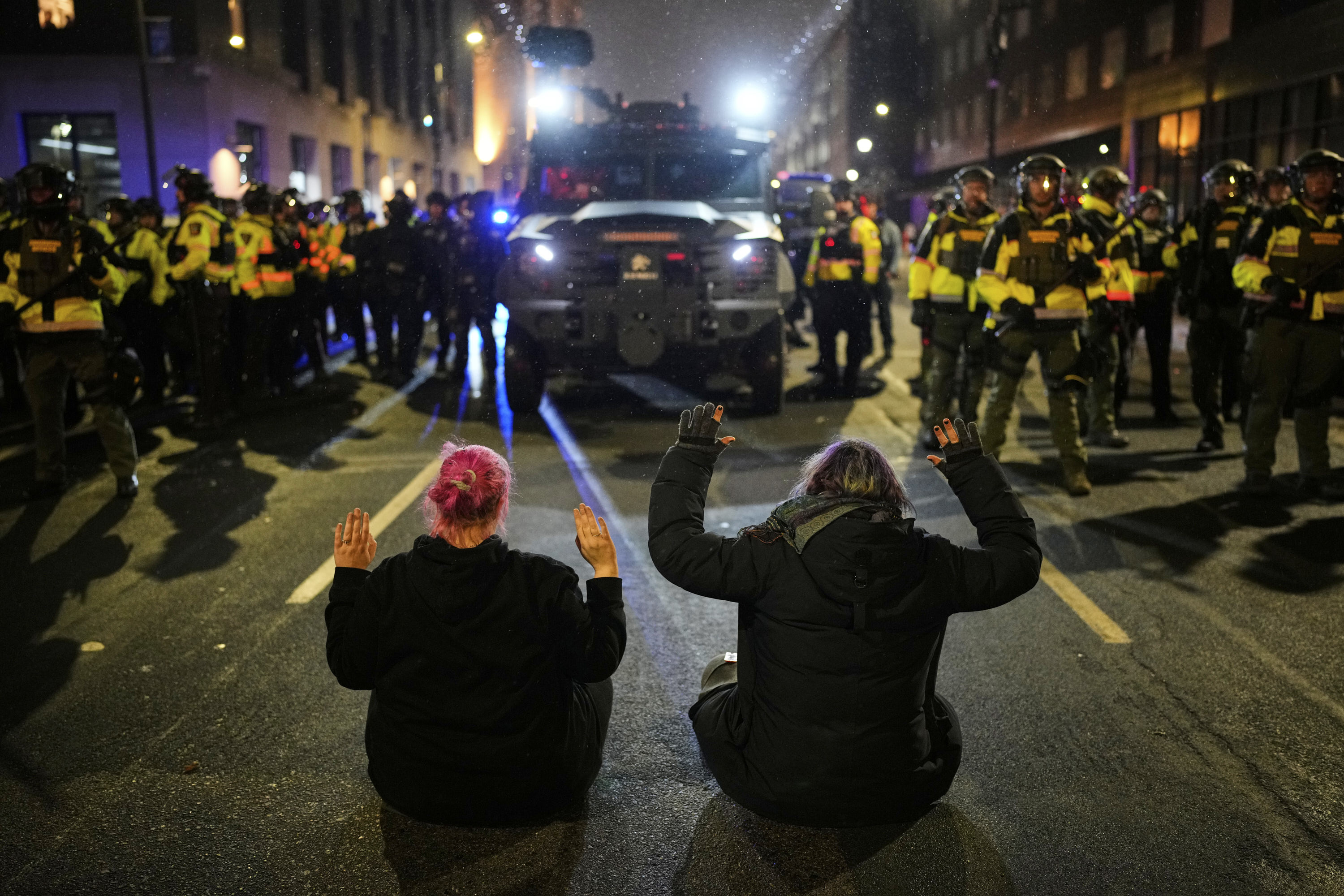 People take part in a protest calling for an end to federal immigration enforcement operations in Minneapolis.