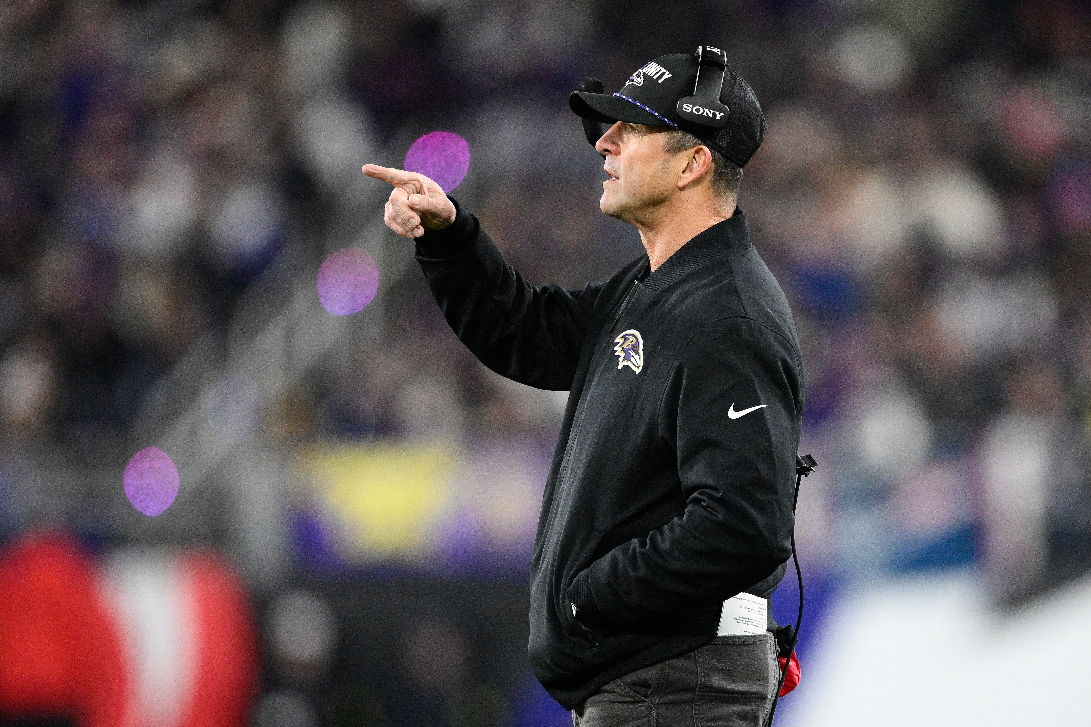 Baltimore Ravens head coach John Harbaugh gestures during the first half of an NFL football game against the New England Patriots, Sunday, Dec. 21, 2025, in Baltimore.