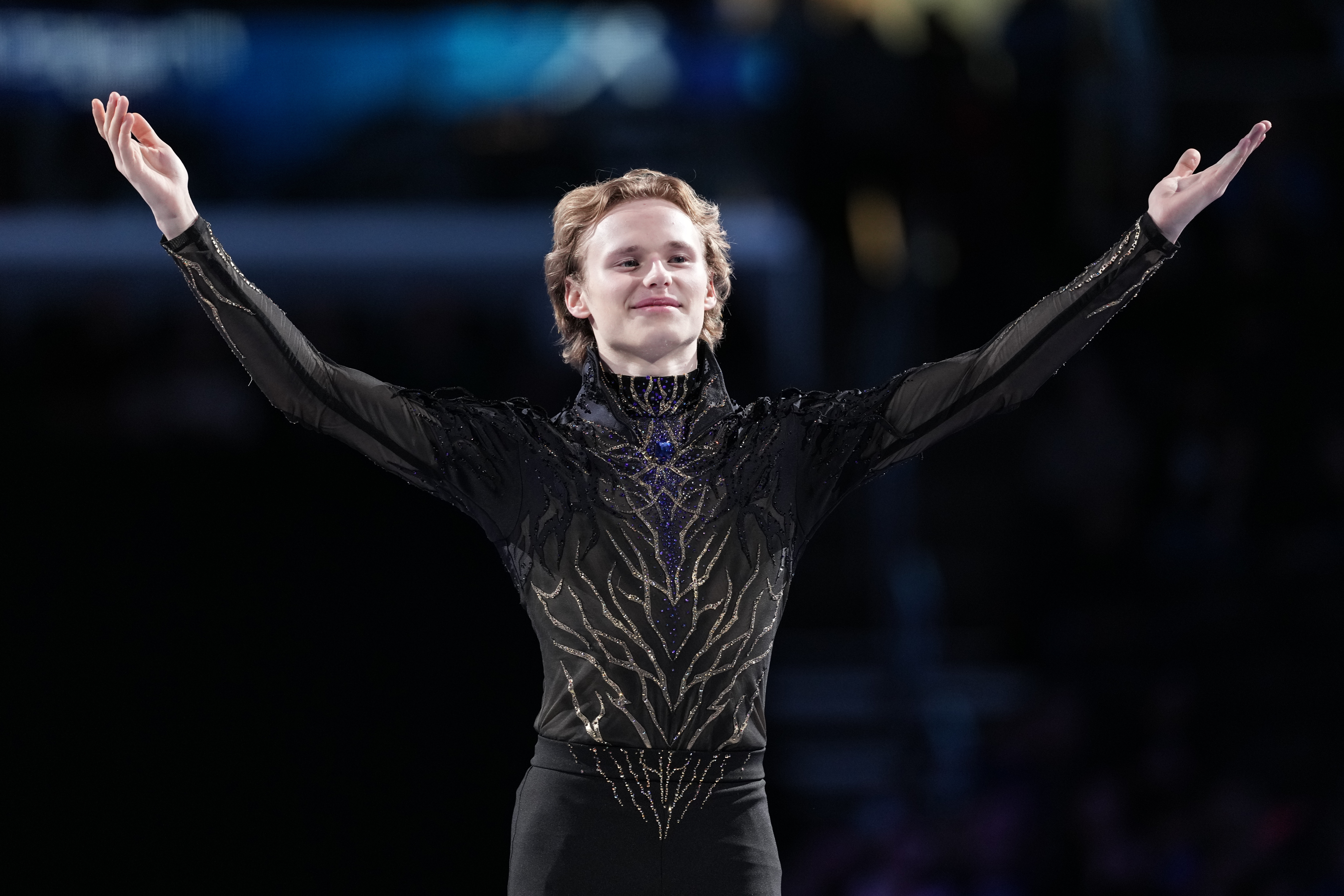 Ilia Malinin acknowledges the crowd after finishing first in the men's free skate competition at the U.S. Figure Skating Championships, Saturday, Jan. 10, 2026, in St. Louis.